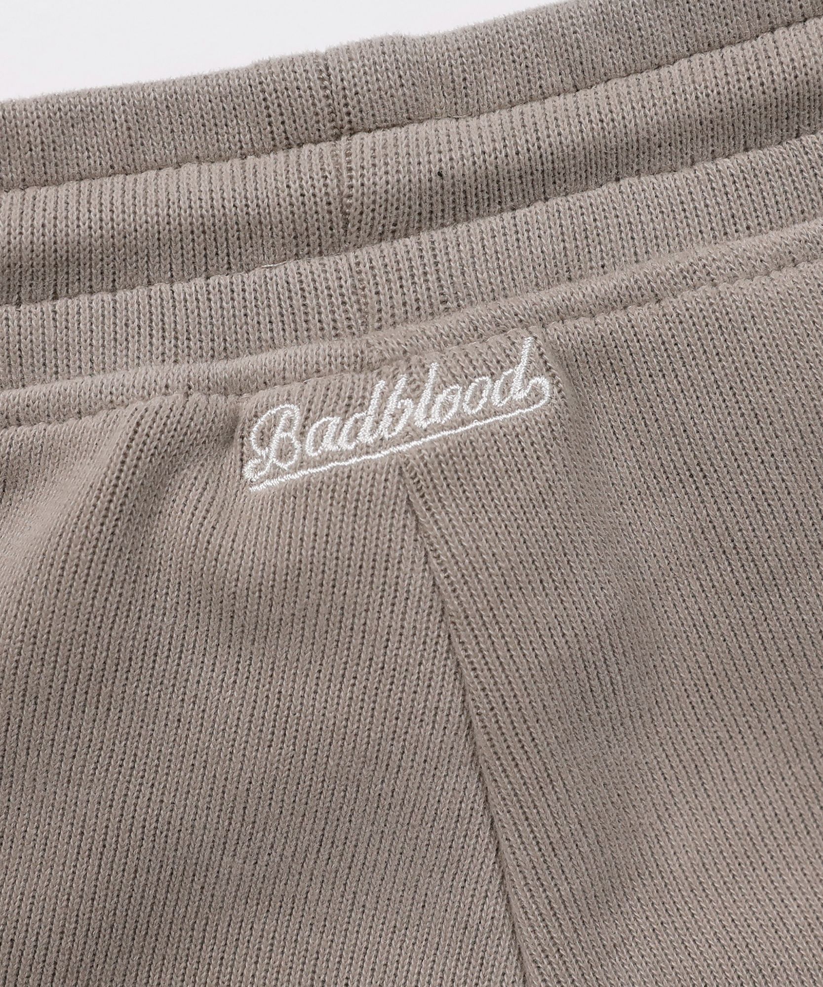 MUSINSA | BADBLOOD Beyond Soft Dolphin Shorts - Tobacco