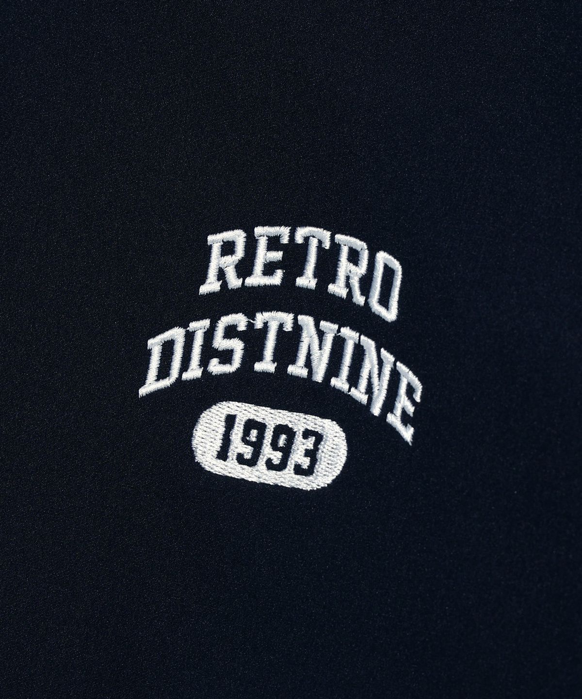 디스트나인(DISTN9NE) 아치 로고 바시티 점퍼 NAVY (LO1JU022-066)