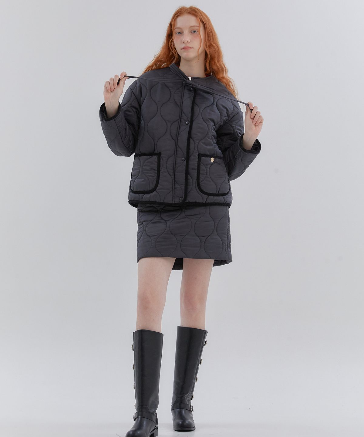 아노에틱(ANOETIC) WAVE LINE QUILTING SKIRT_BLACK