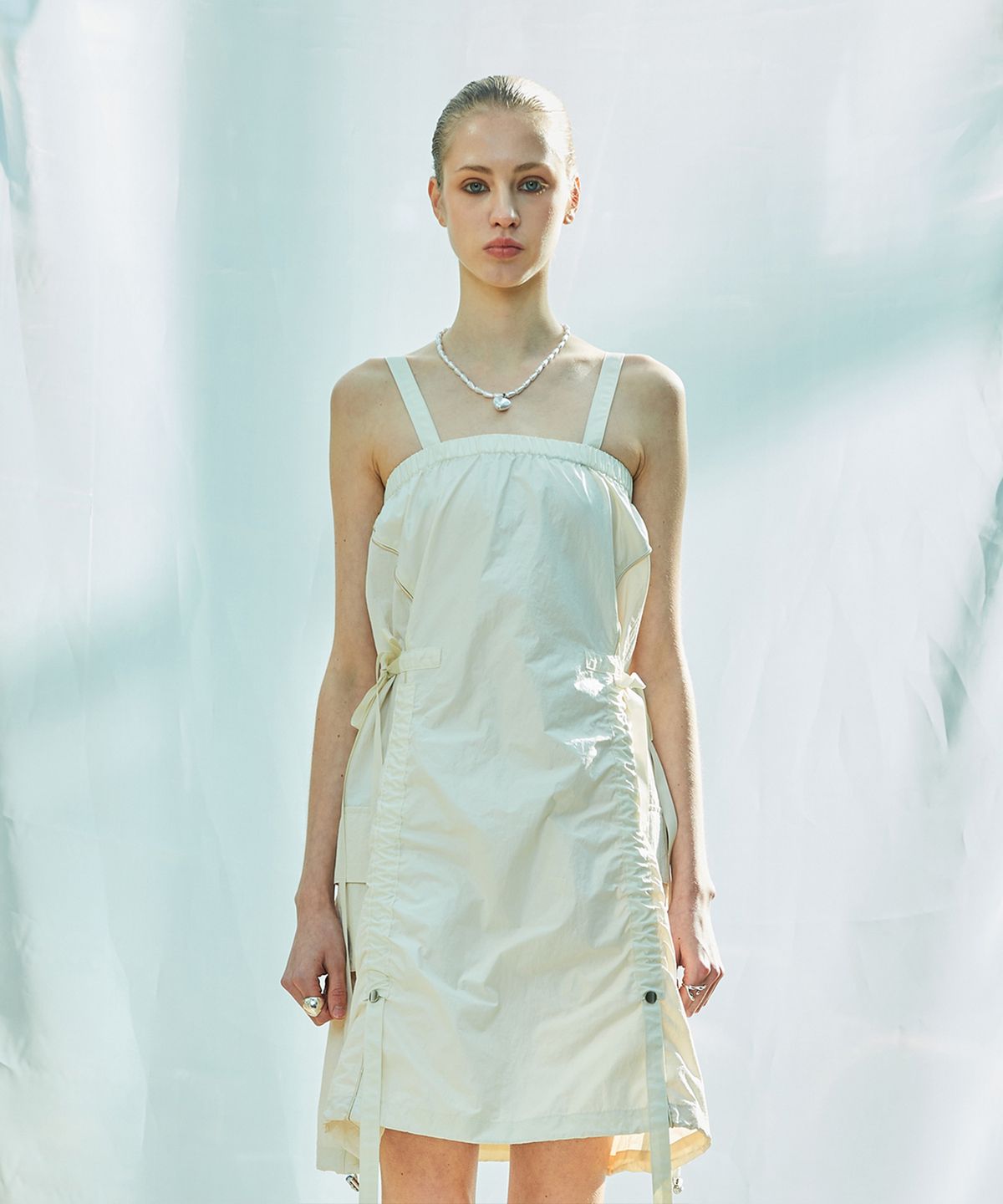 라티젠(LARTIGENT) L9 GLOSSY STRING OPS(CREAM)