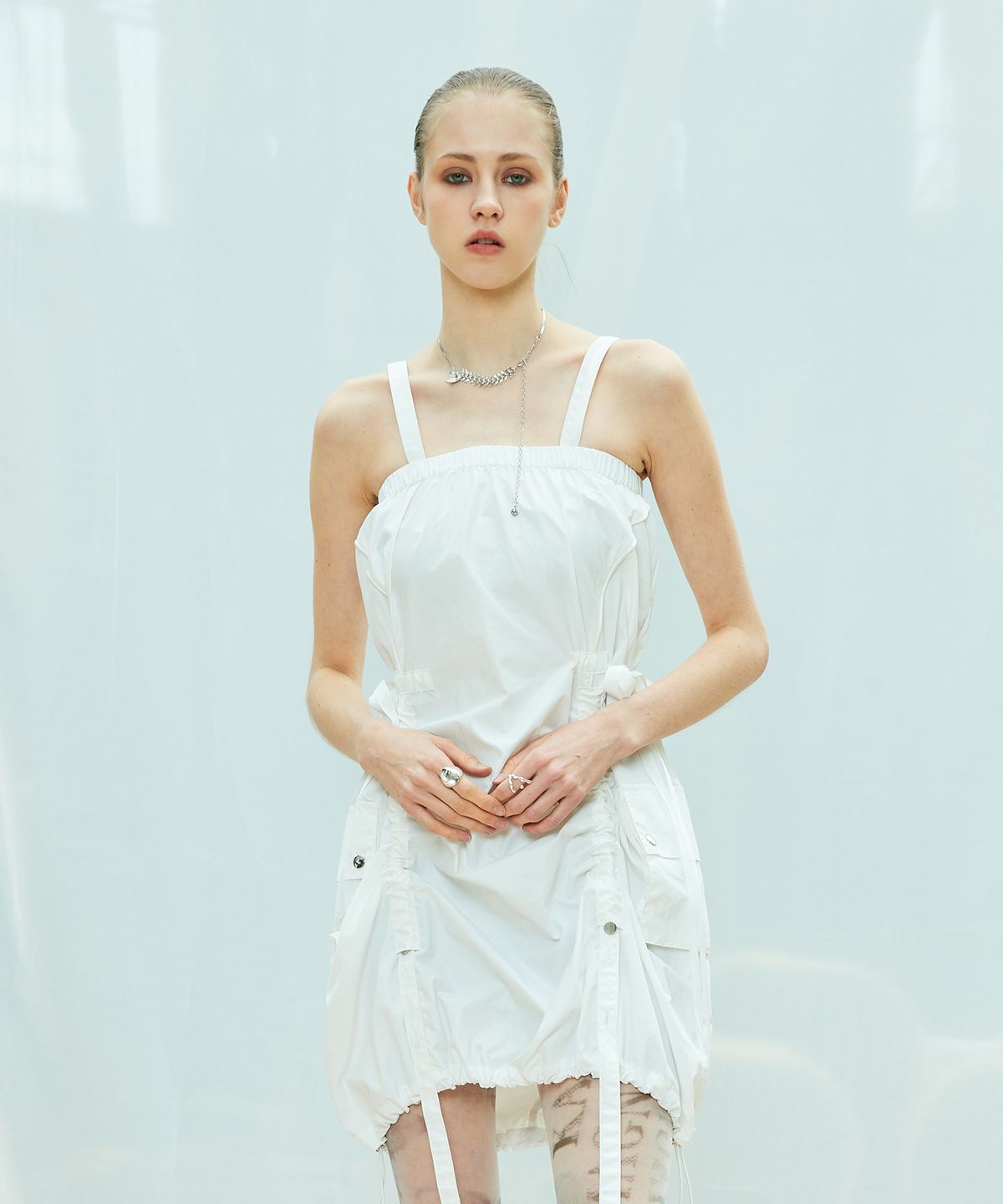 라티젠(LARTIGENT) L9 GLOSSY STRING OPS(WHITE)