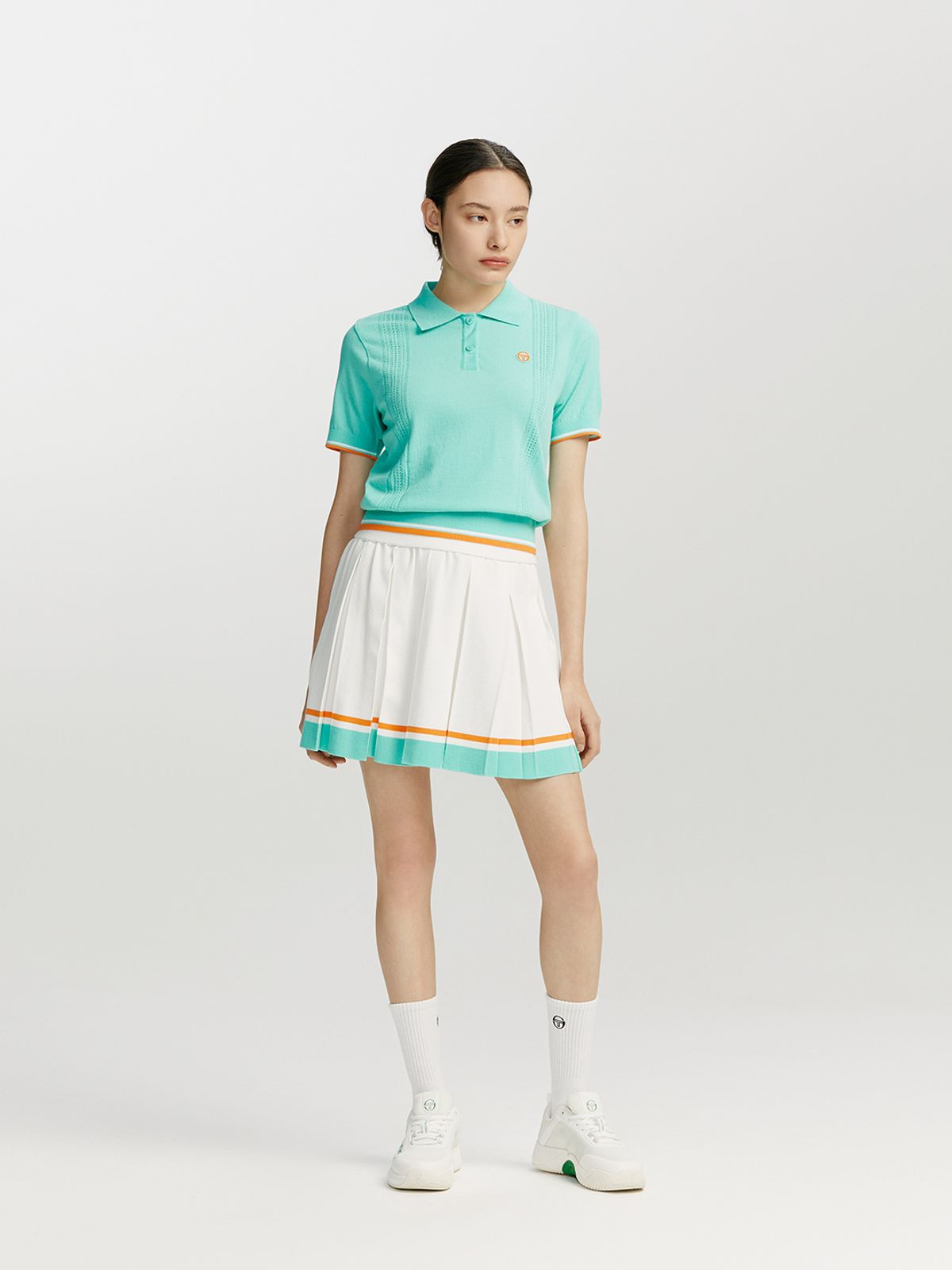 세르지오 타키니(SERGIO TACCHINI) W 프레피 니트 밑단 배색 플리츠 스커트 (White)