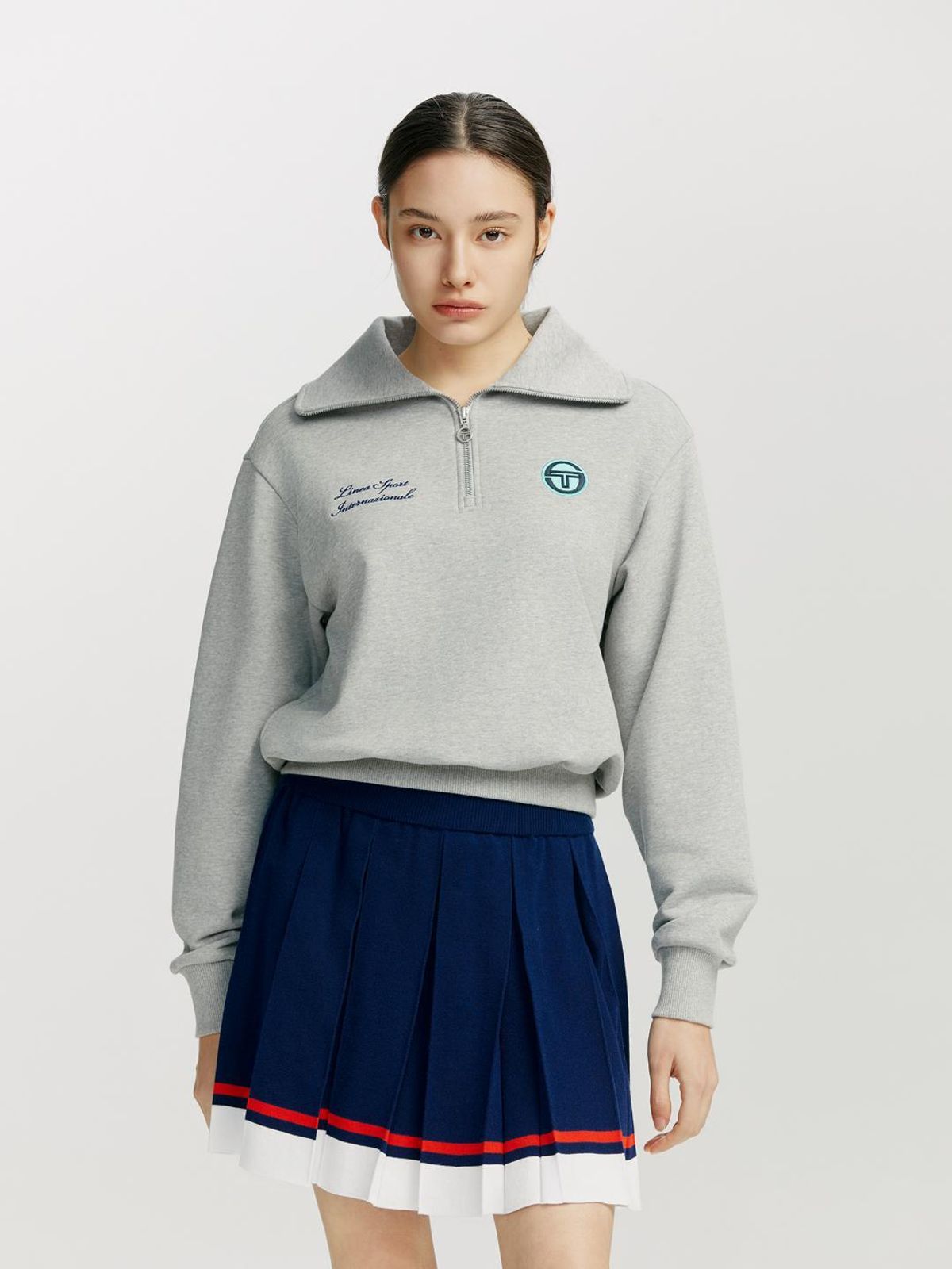 세르지오 타키니(SERGIO TACCHINI) W 프레피 니트 밑단 배색 플리츠 스커트 (Navy)