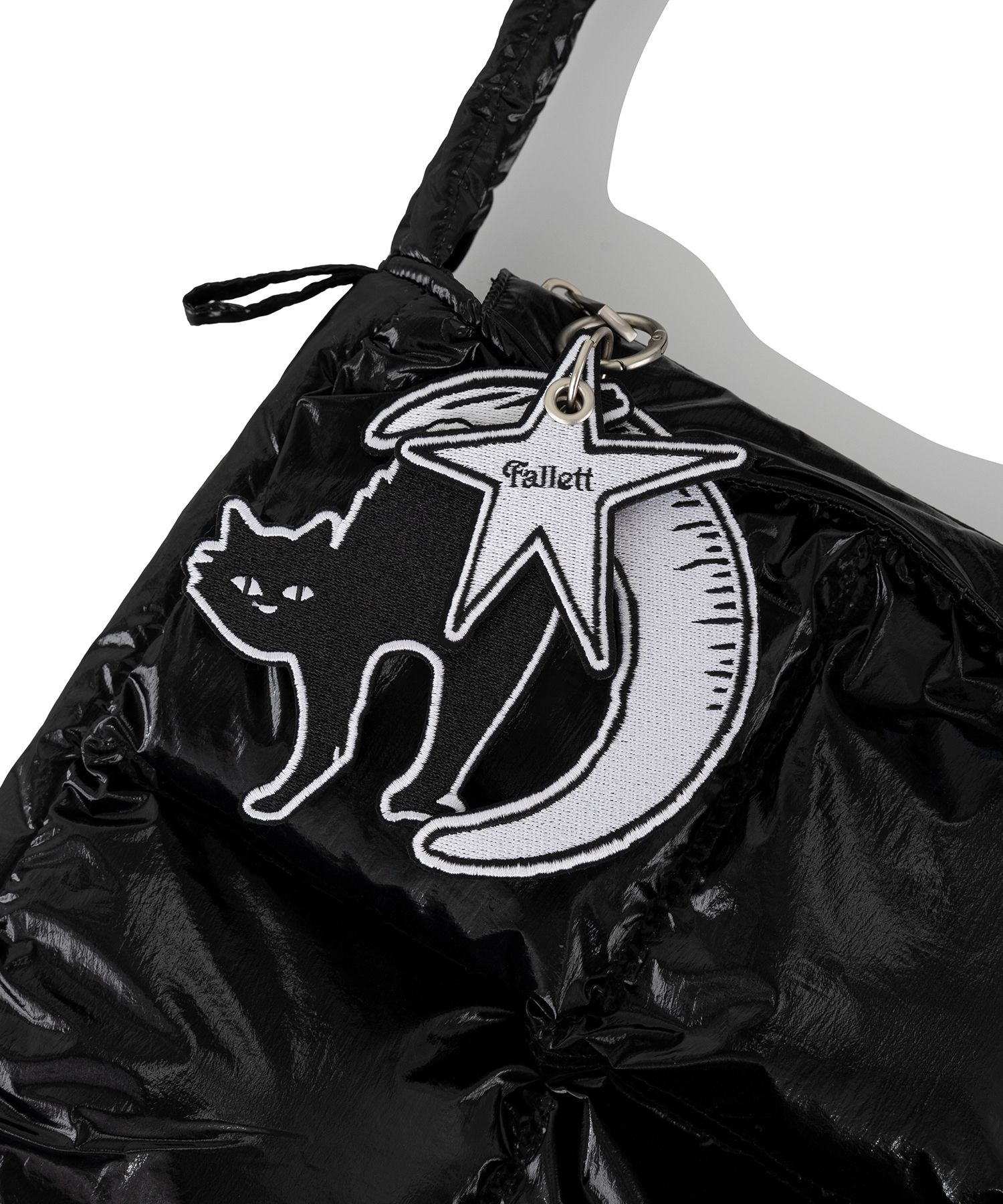 MUSINSA | FALLETT Nero Badge Padded Bag Glossy Black