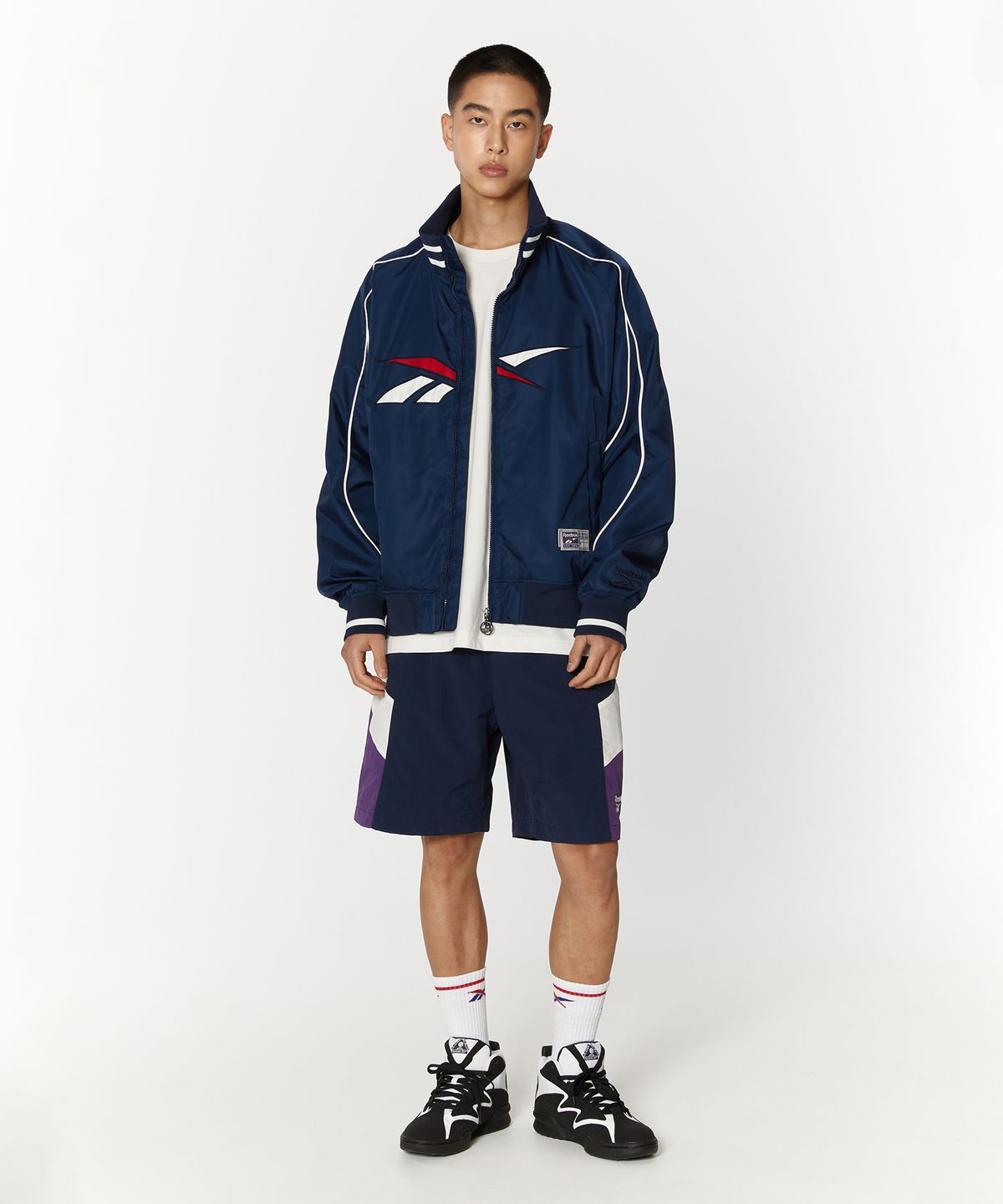 리복(REEBOK) 벡터 스타디움 바시티 자켓 - 네이비