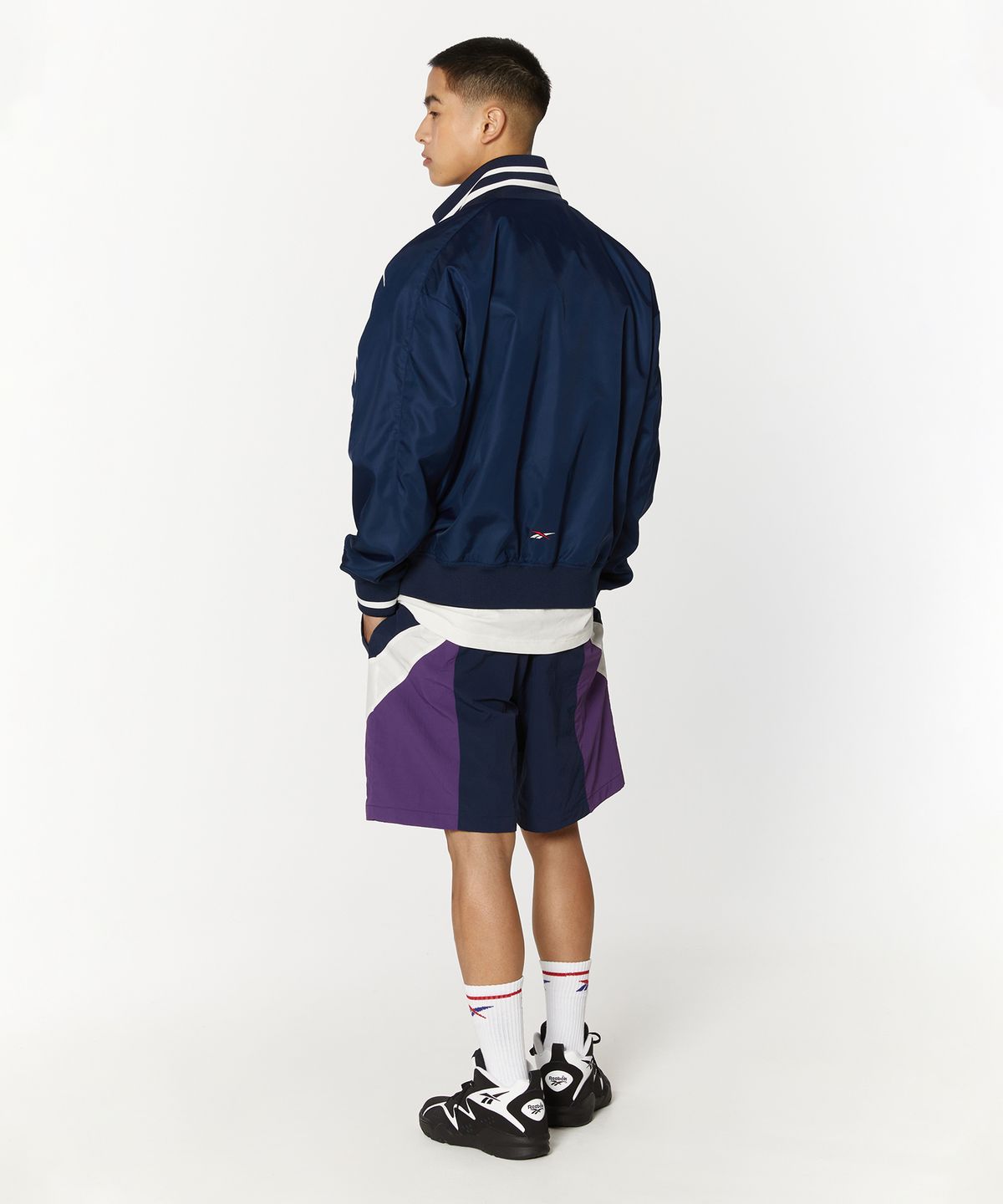 리복(REEBOK) 벡터 스타디움 바시티 자켓 - 네이비