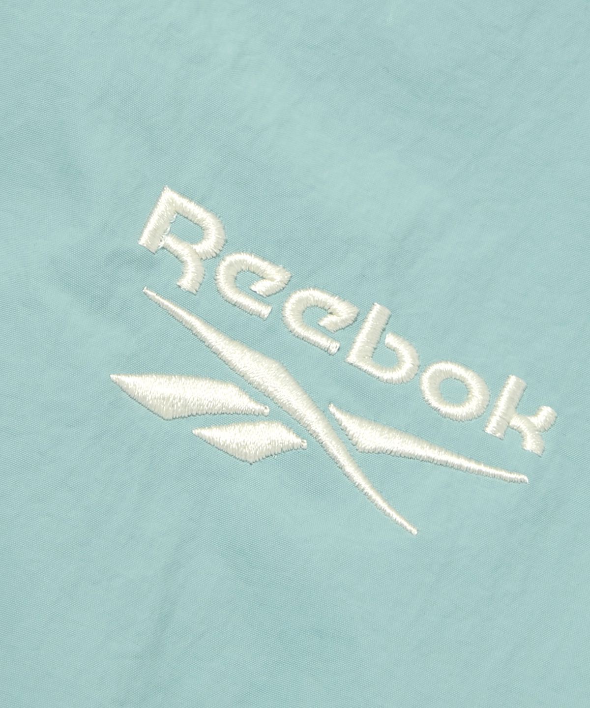 리복(REEBOK) 레전드 웜업 윈드 브레이커 - 민트