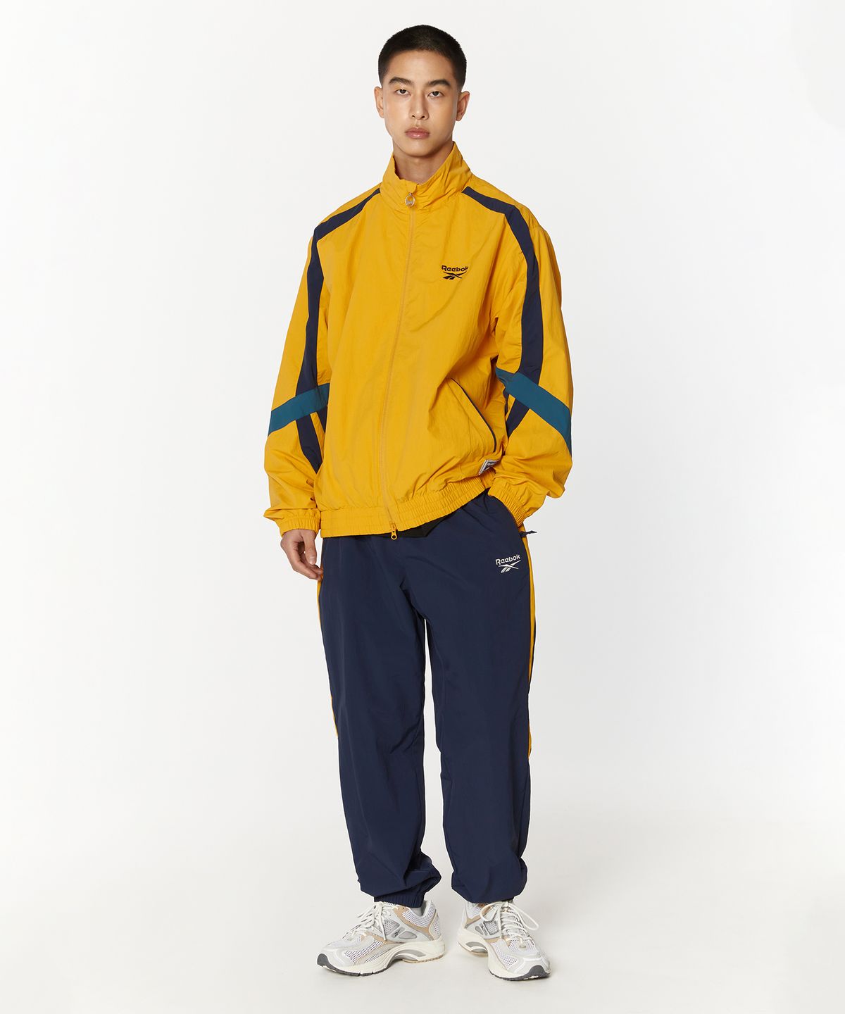 리복(REEBOK) 레전드 웜업 윈드 브레이커 - 옐로우:네이비