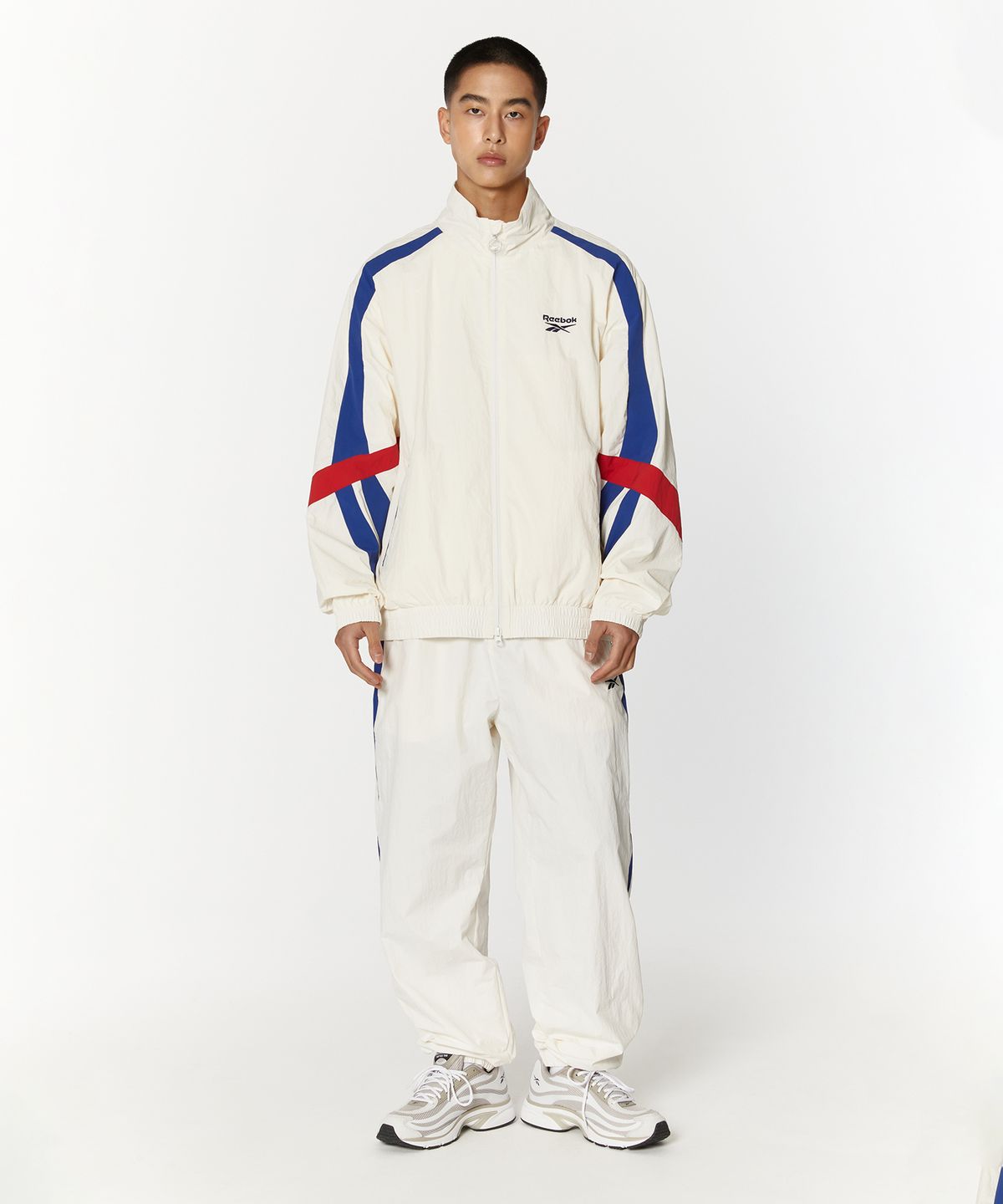 리복(REEBOK) 레전드 웜업 팬츠 - 오프 화이트