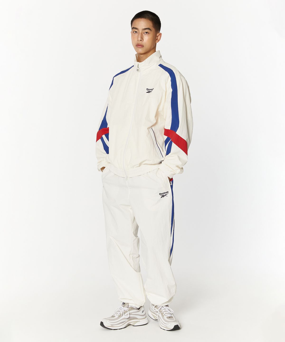 리복(REEBOK) 레전드 웜업 팬츠 - 오프 화이트
