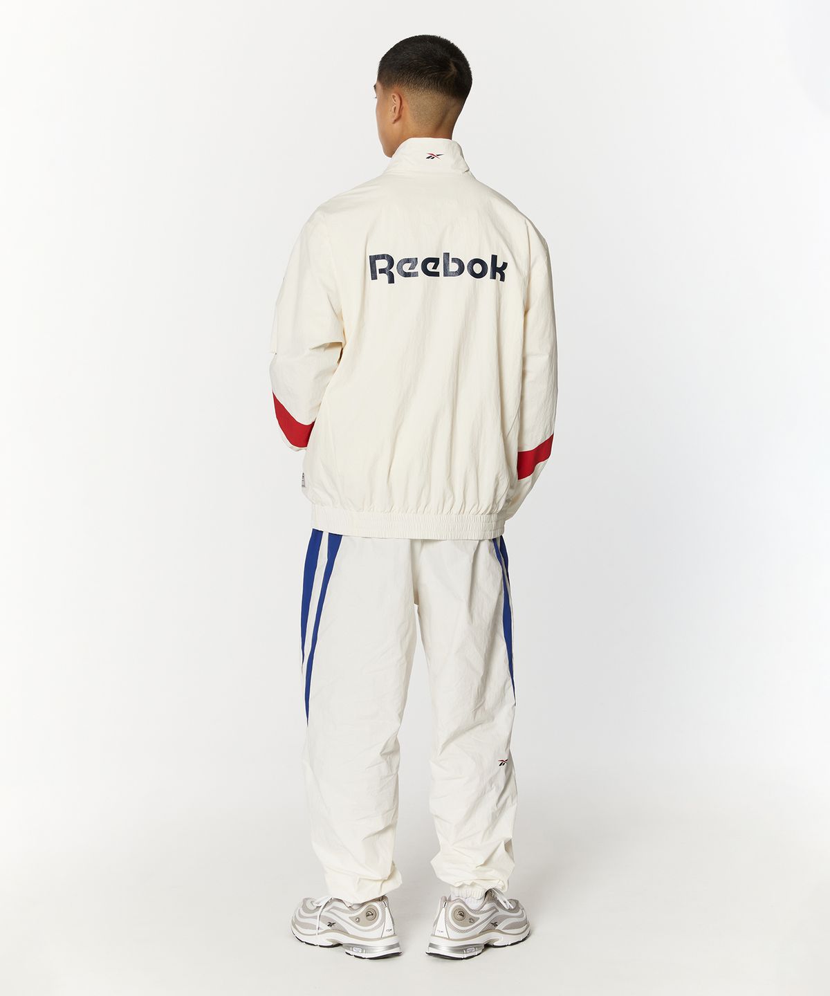 리복(REEBOK) 레전드 웜업 팬츠 - 오프 화이트