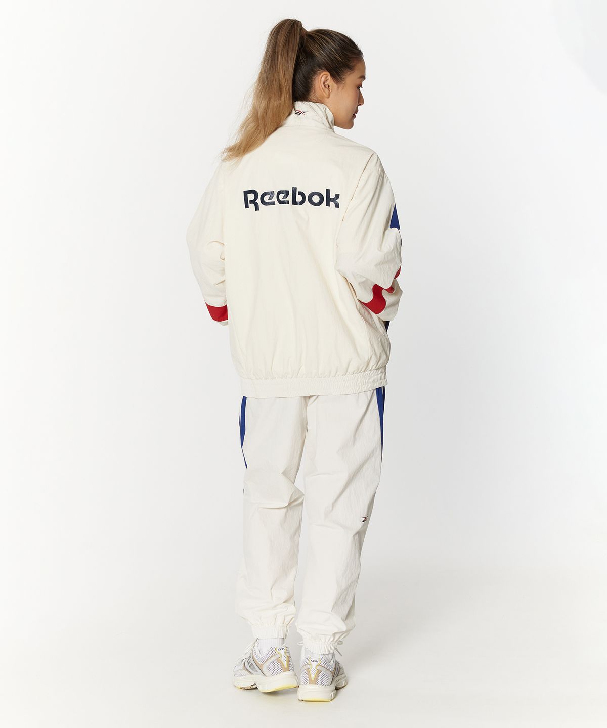 리복(REEBOK) 레전드 웜업 팬츠 - 오프 화이트