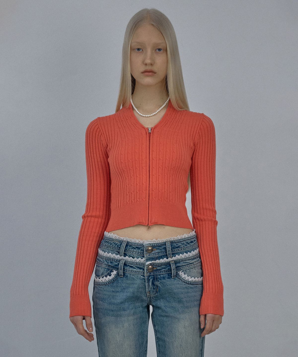스컬프터(SCULPTOR) Cable Collar Knit Zip-Up Coral