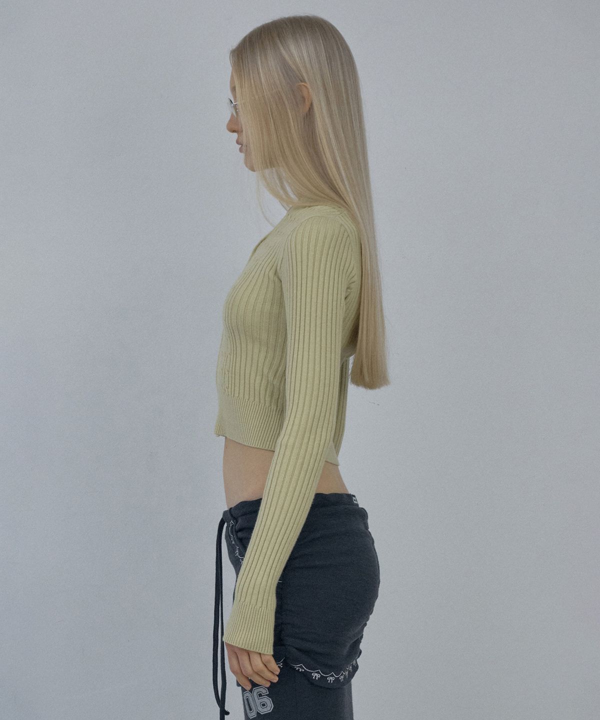 스컬프터(SCULPTOR) Cable Collar Knit Zip-Up Dusty Lemon