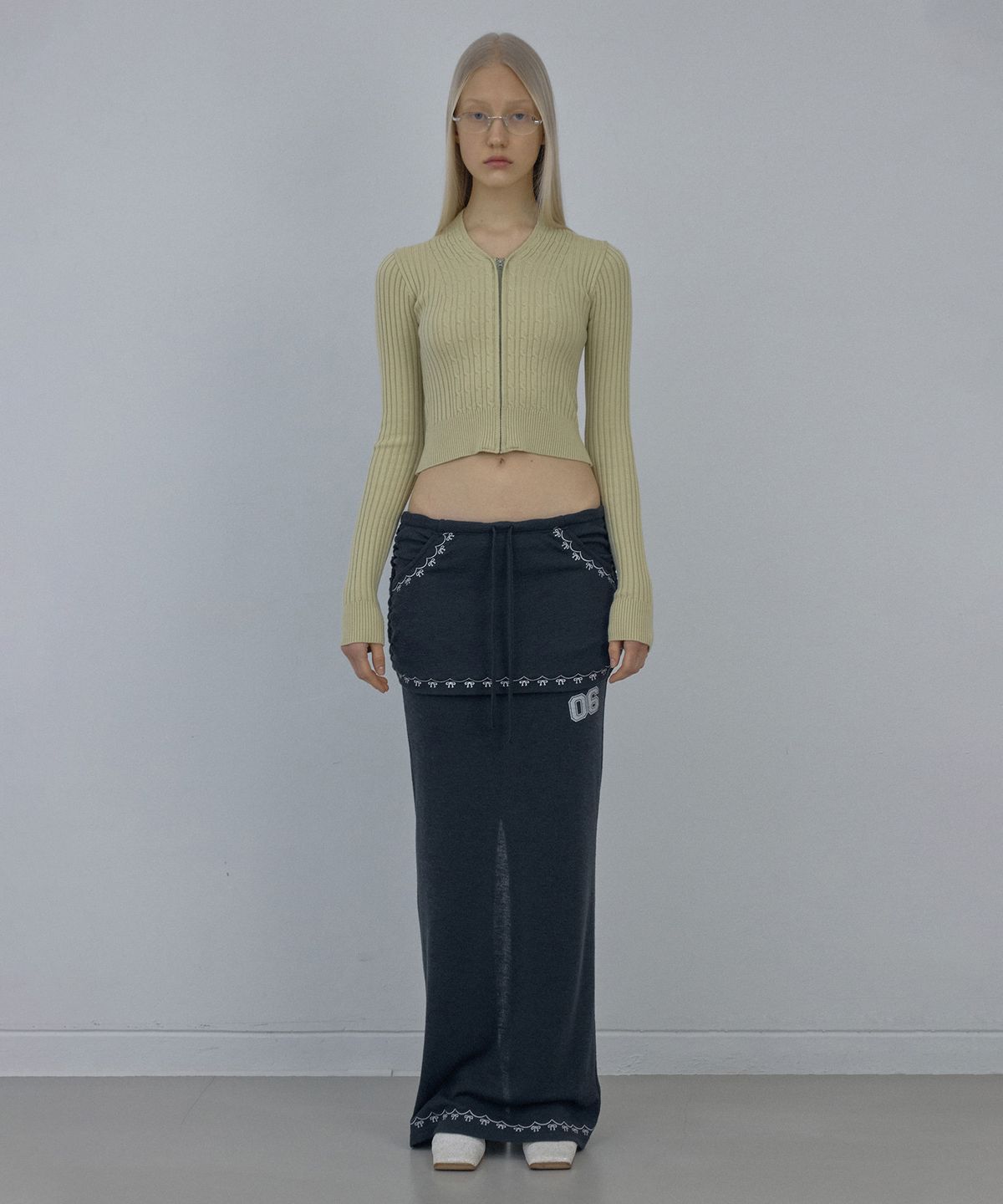 스컬프터(SCULPTOR) Cable Collar Knit Zip-Up Dusty Lemon