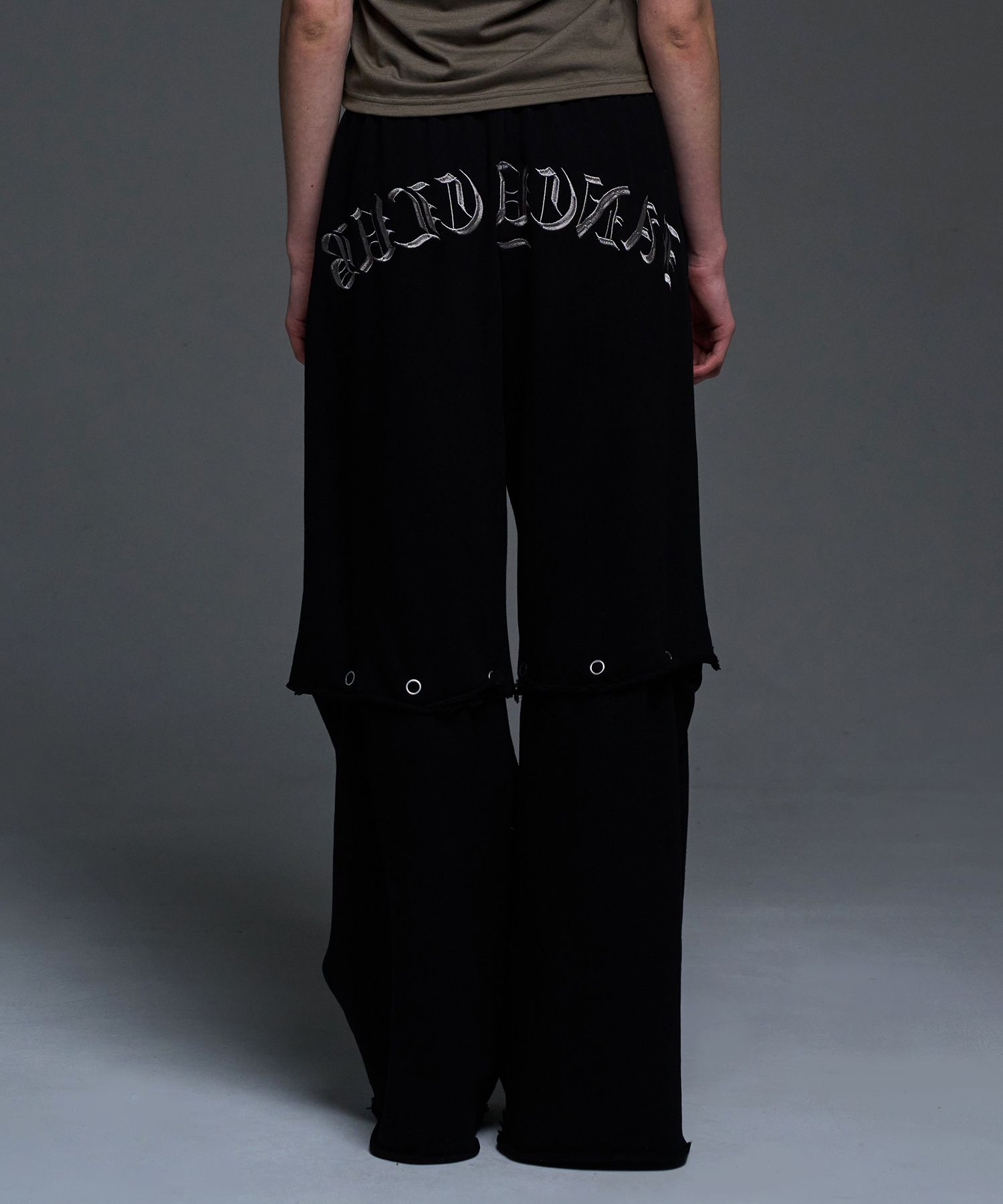 MUSINSA | FANCY CLUB [NF] Two-way punch lettering sweatpants