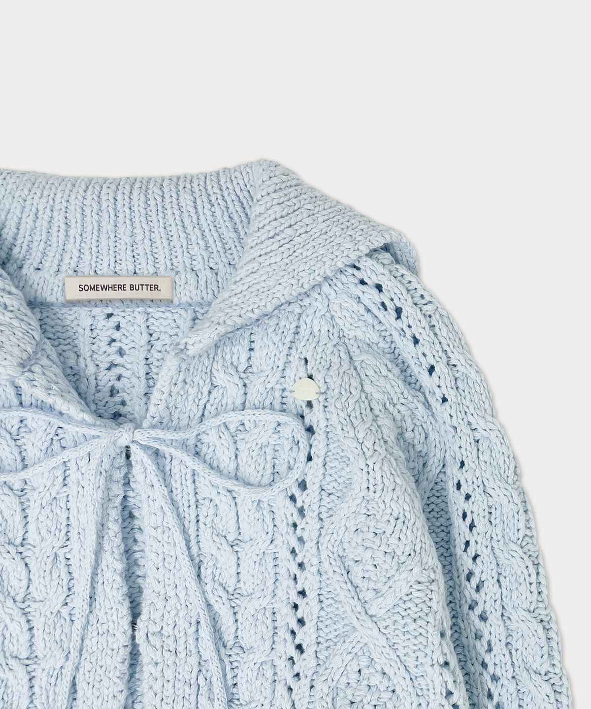 썸웨어버터(SOMEWHEREBUTTER) Ribbon cable cardigan - light blue