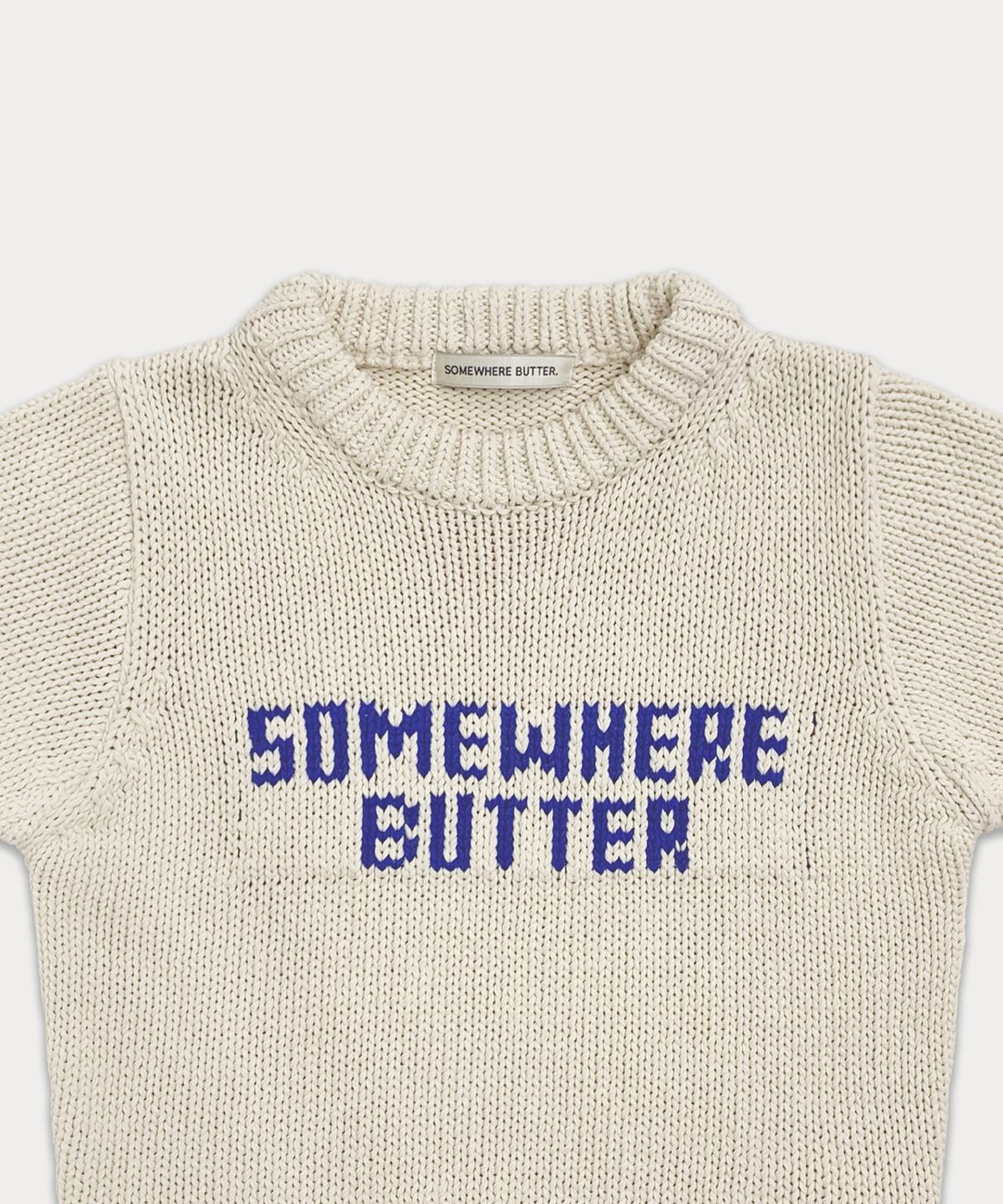 썸웨어버터(SOMEWHEREBUTTER) Classy Logo half knit - cream