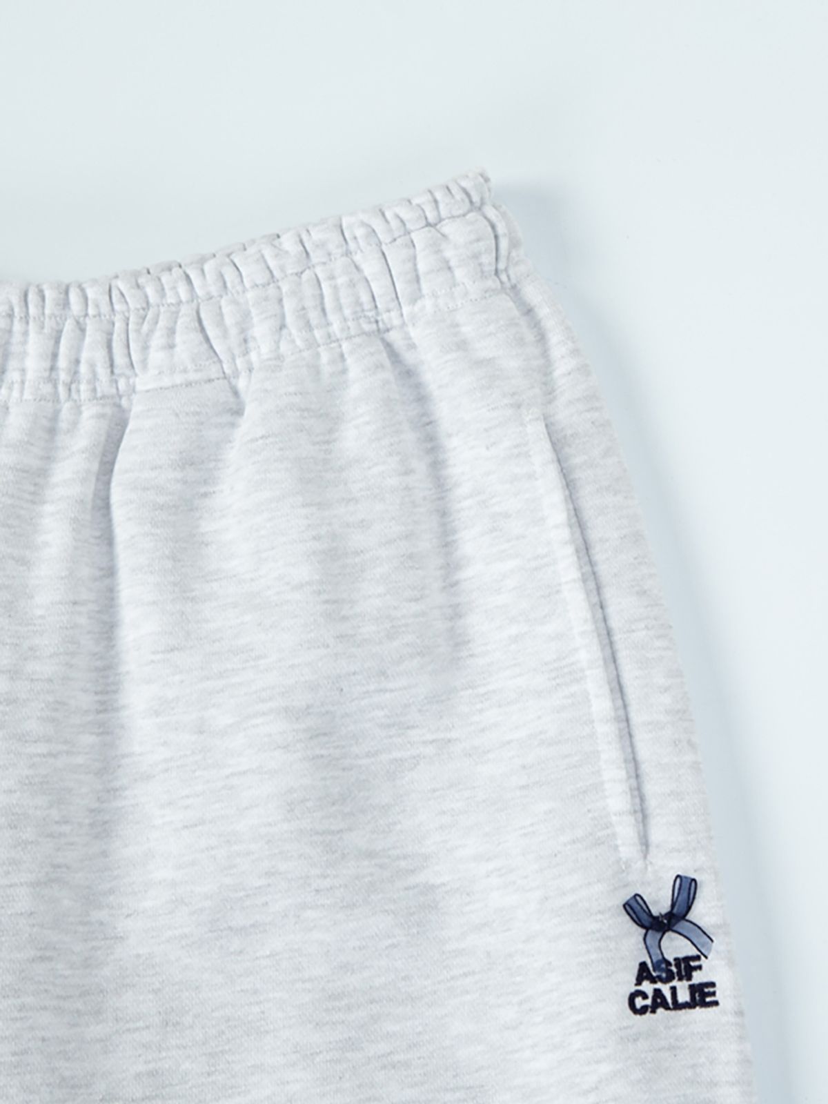 에즈이프 캘리(ASIF CALIE) RIBBON JOGGER PANTS WHITEMELANGE