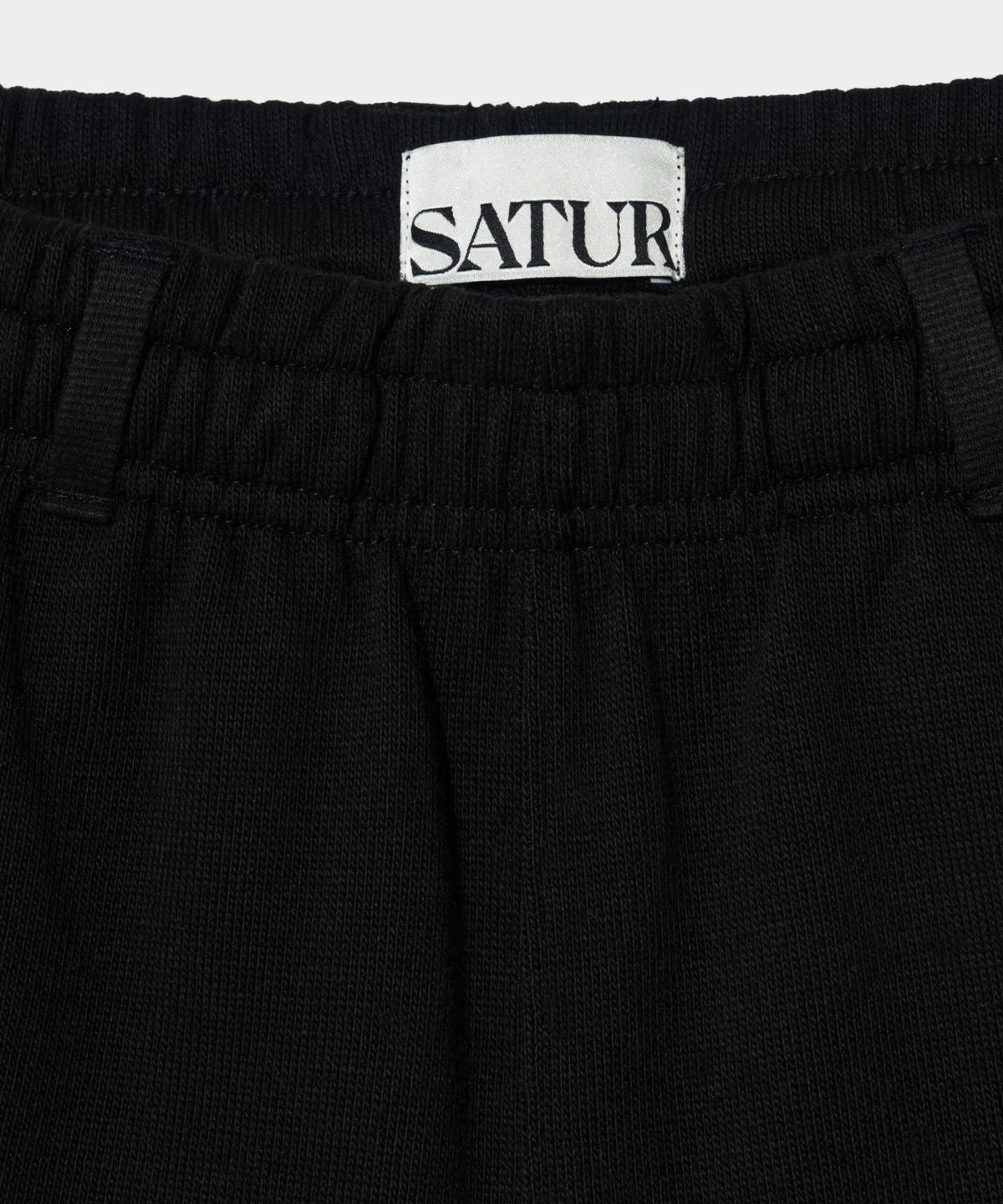 세터(SATUR) (W) 로턴 올 데이 트랙 쇼츠 캐비어 블랙
