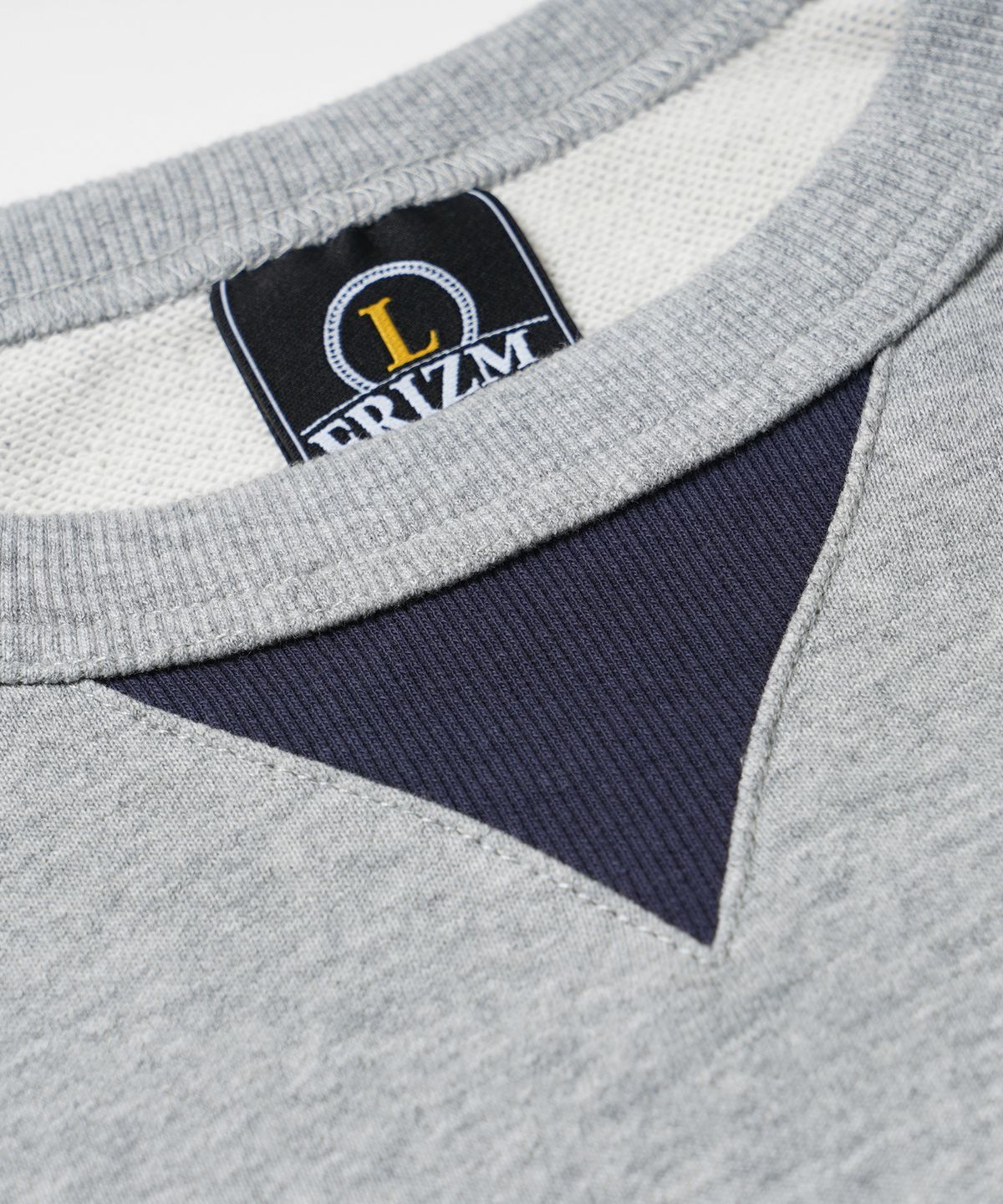 프리즘웍스(FRIZMWORKS) ROUNDED RAGLAN SWEATSHIRT _ NAVY