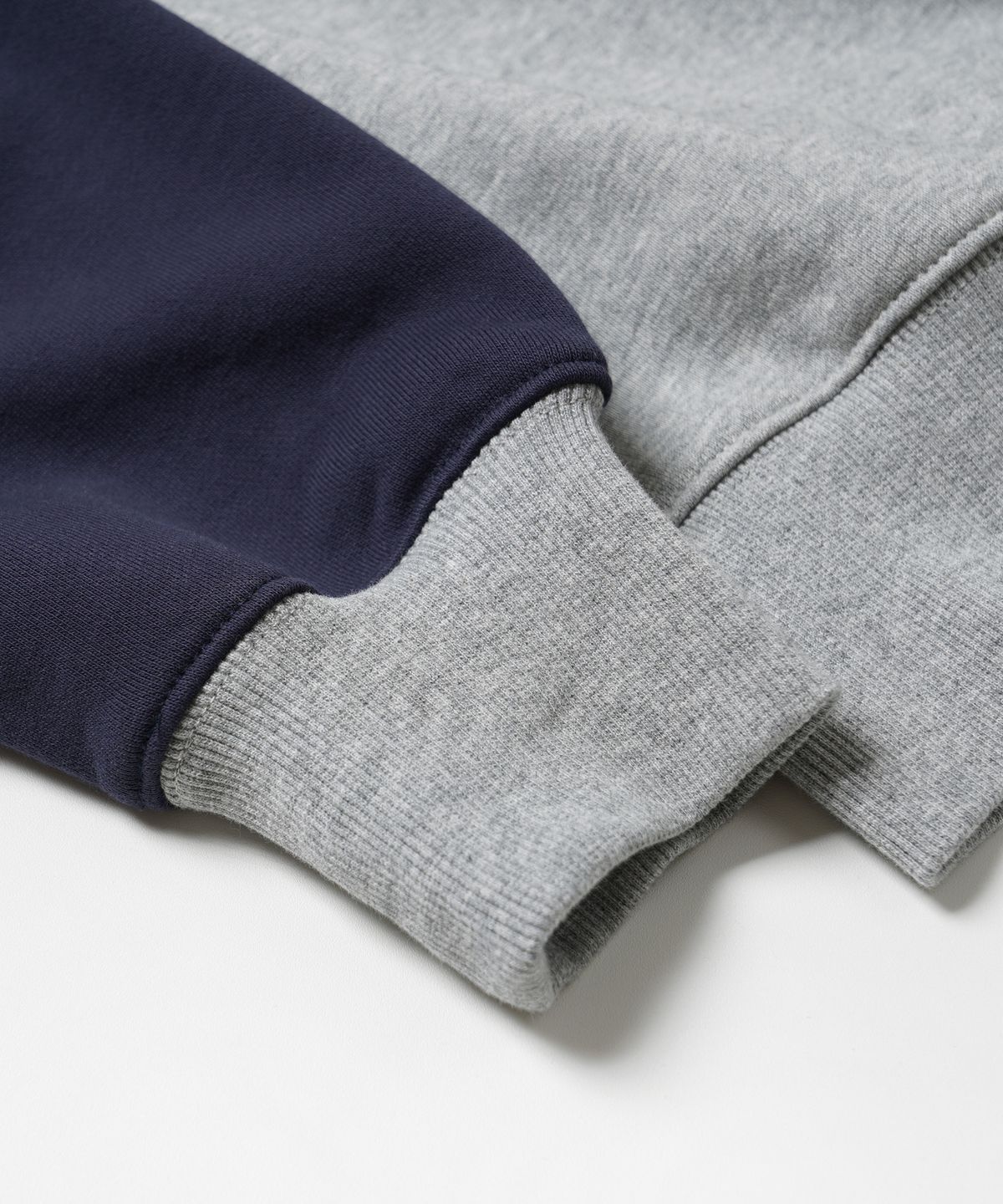 프리즘웍스(FRIZMWORKS) ROUNDED RAGLAN SWEATSHIRT _ NAVY