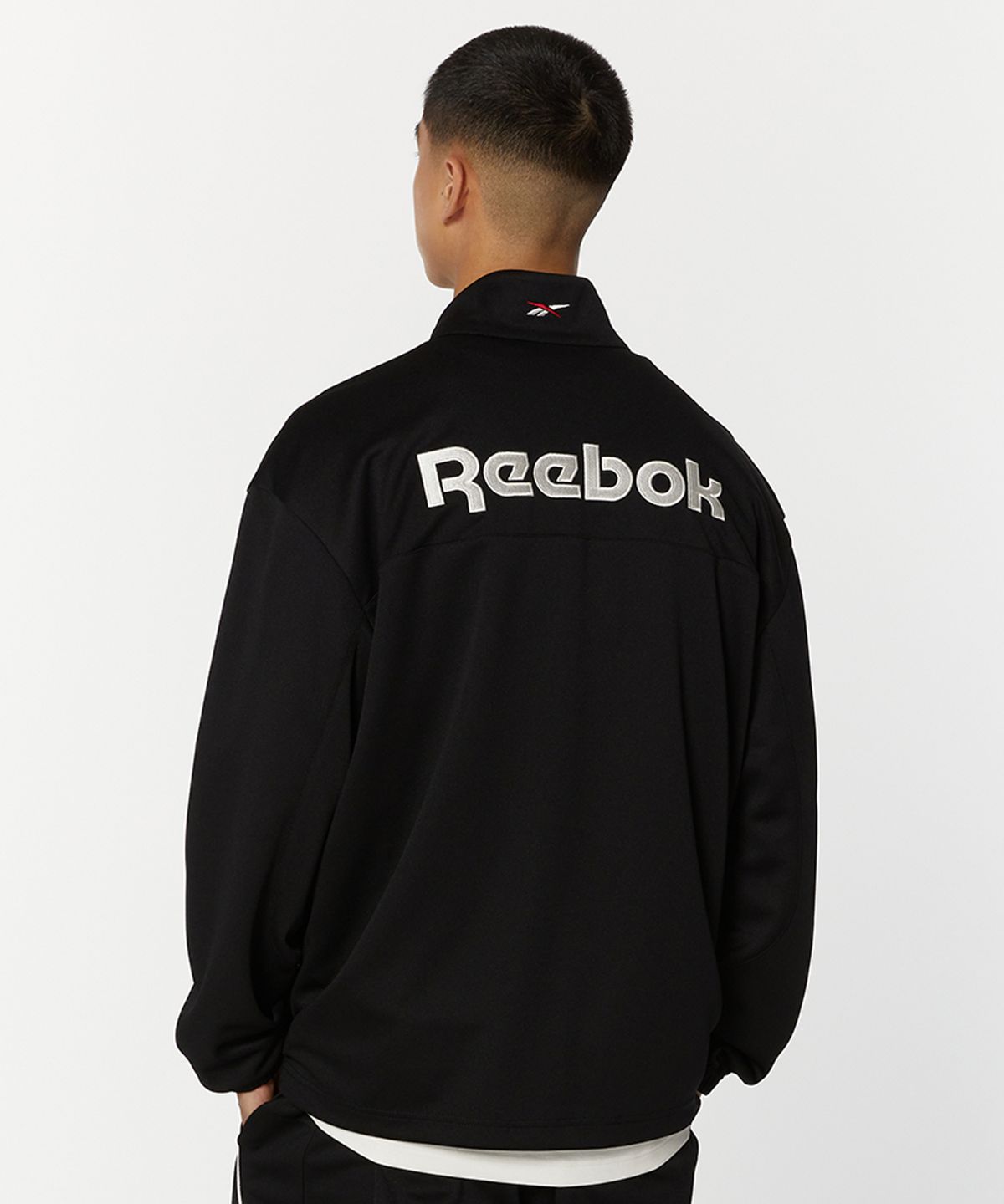 리복(REEBOK) 웜업 트랙탑 - 블랙