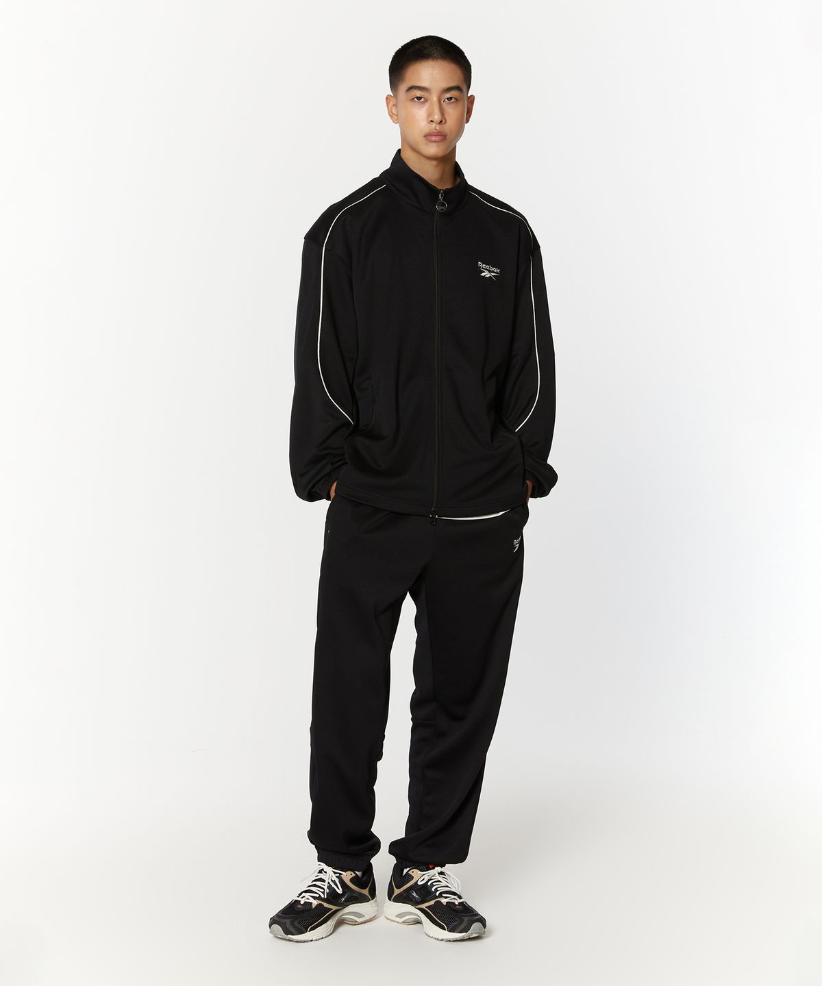 리복(REEBOK) 웜업 트랙탑 - 블랙