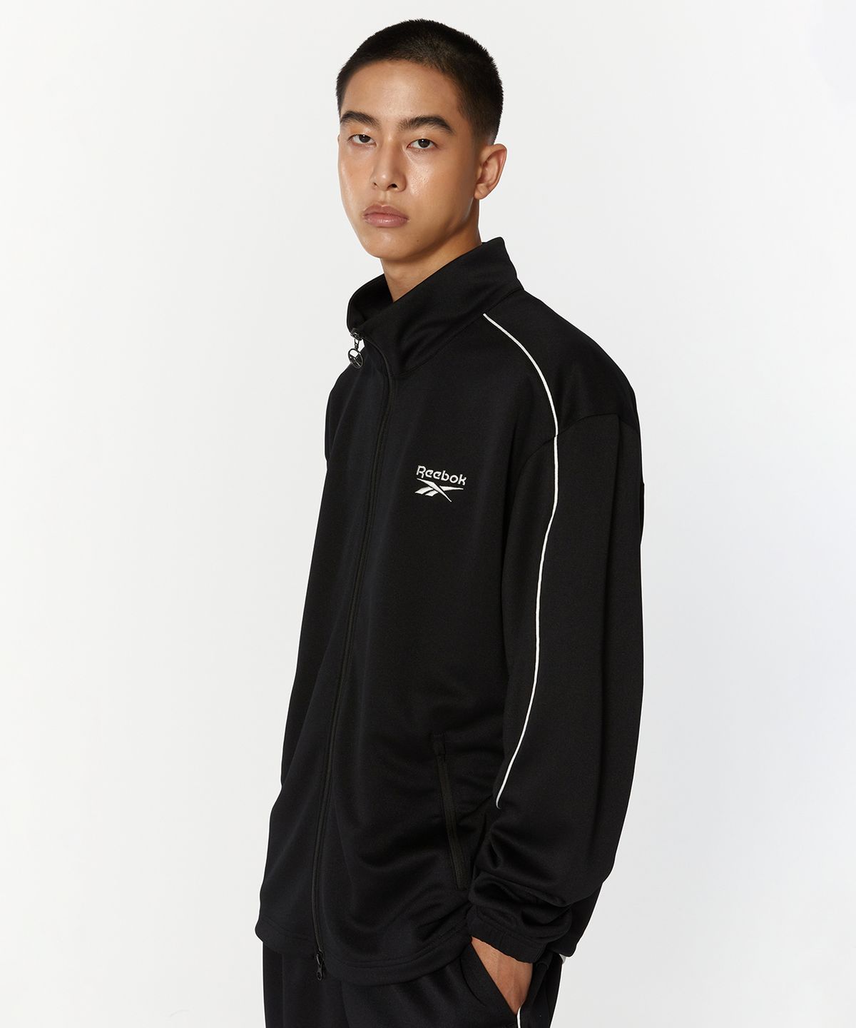 리복(REEBOK) 웜업 트랙탑 - 블랙