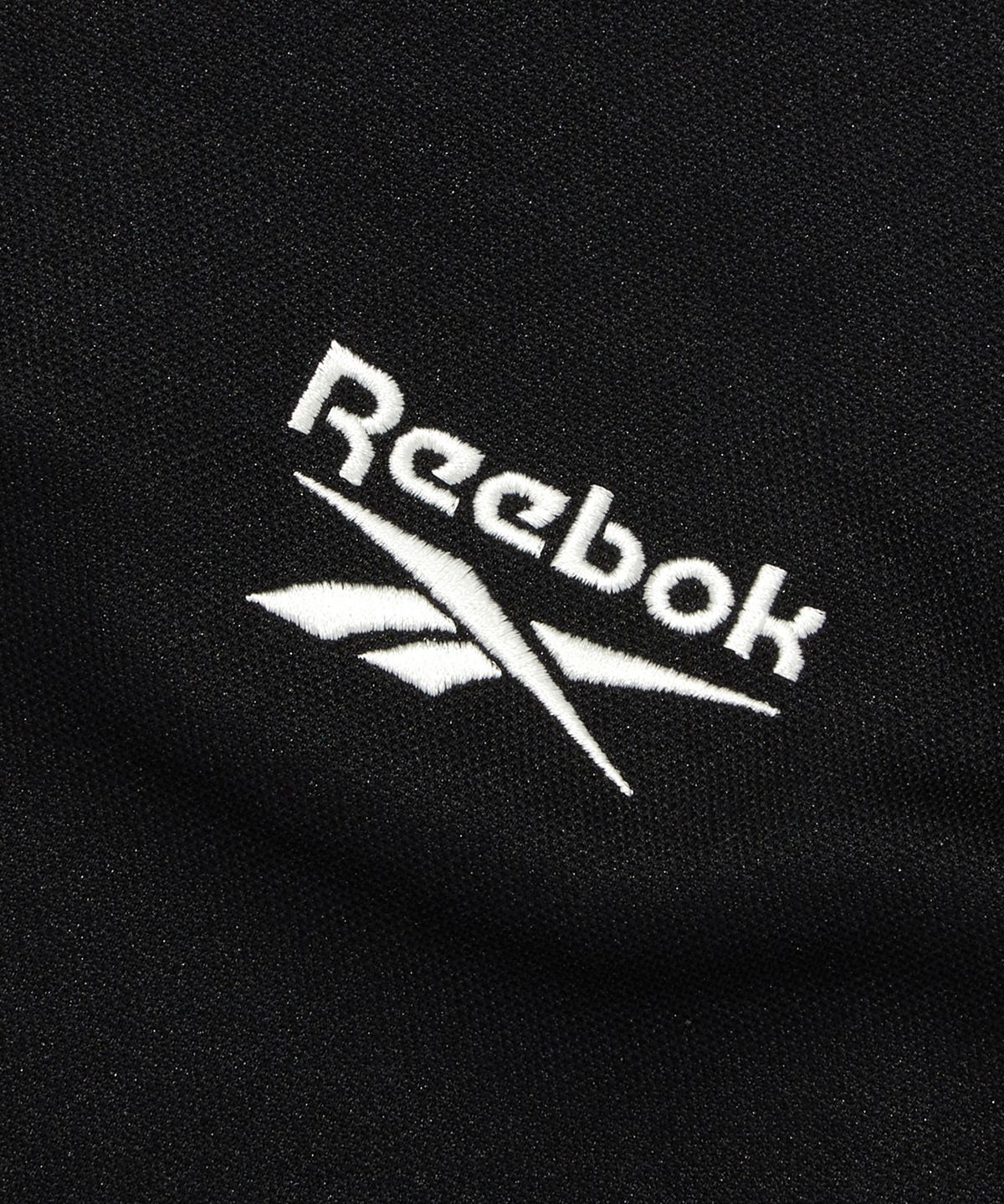 리복(REEBOK) 웜업 트랙탑 - 블랙