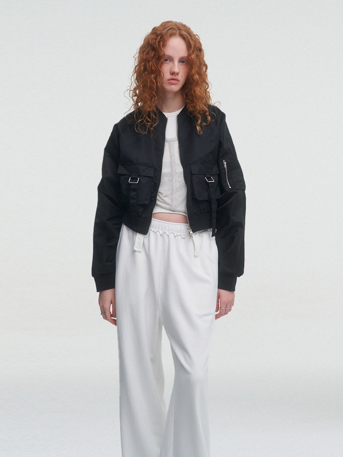 뚜오미오(TUOMIO) BELTED POCKET BOMBER [BLACK]