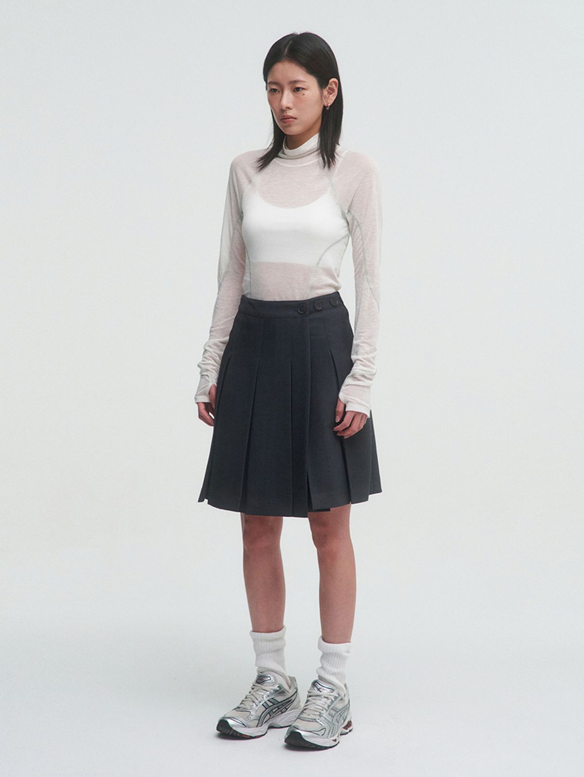 뚜오미오(TUOMIO) SHEER MOCK NECK TOP [IVORY]