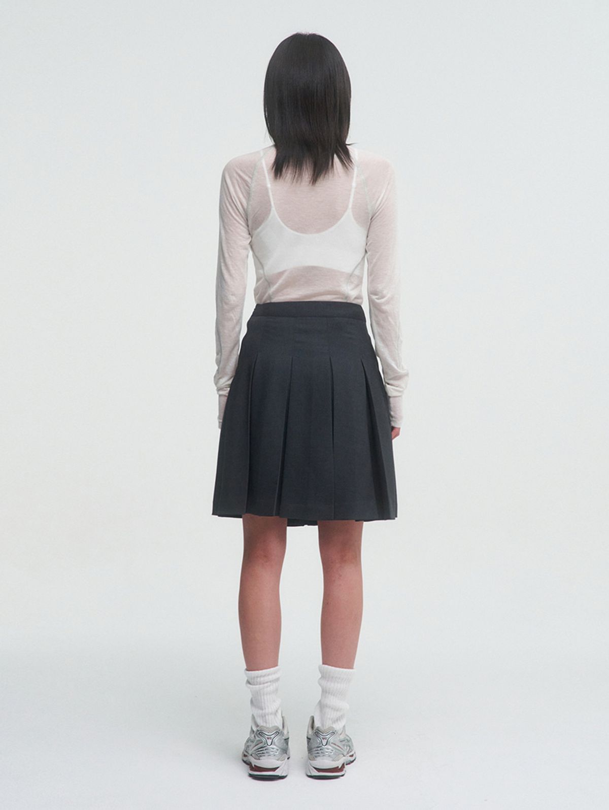 뚜오미오(TUOMIO) SHEER MOCK NECK TOP [IVORY]
