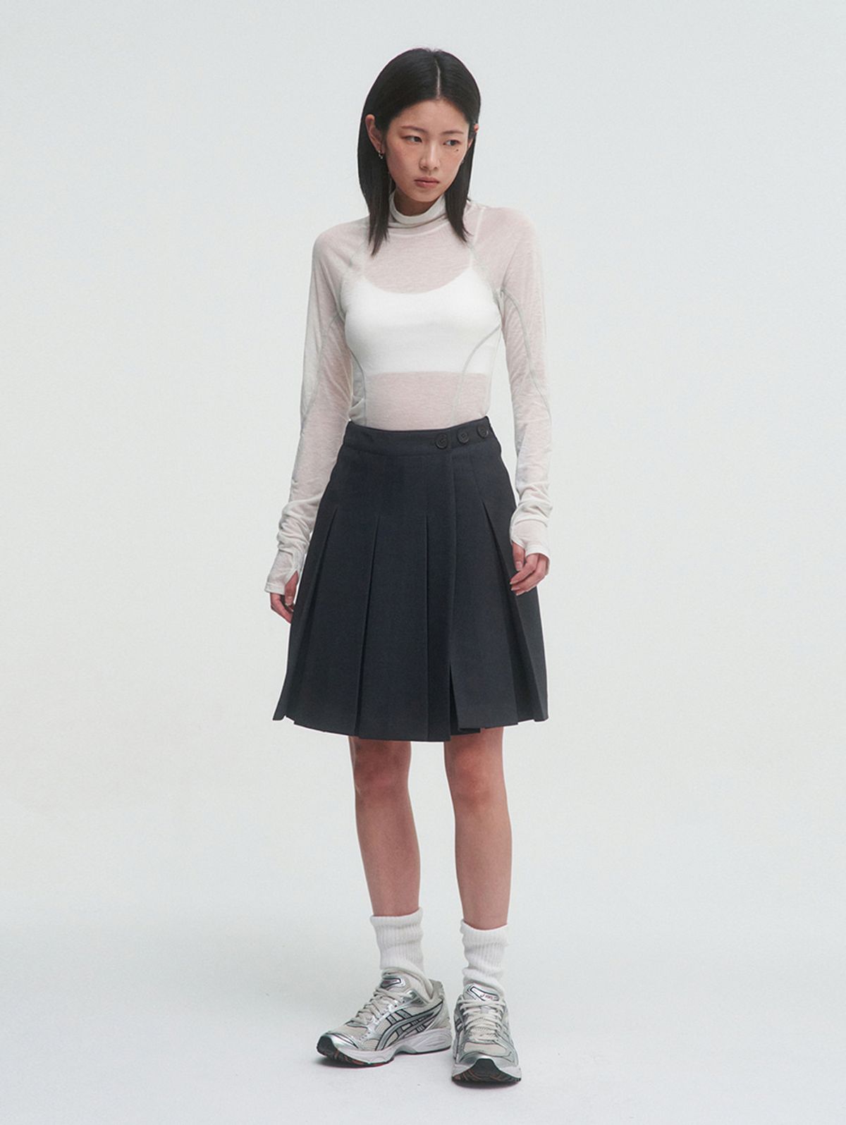 뚜오미오(TUOMIO) SHEER MOCK NECK TOP [IVORY]