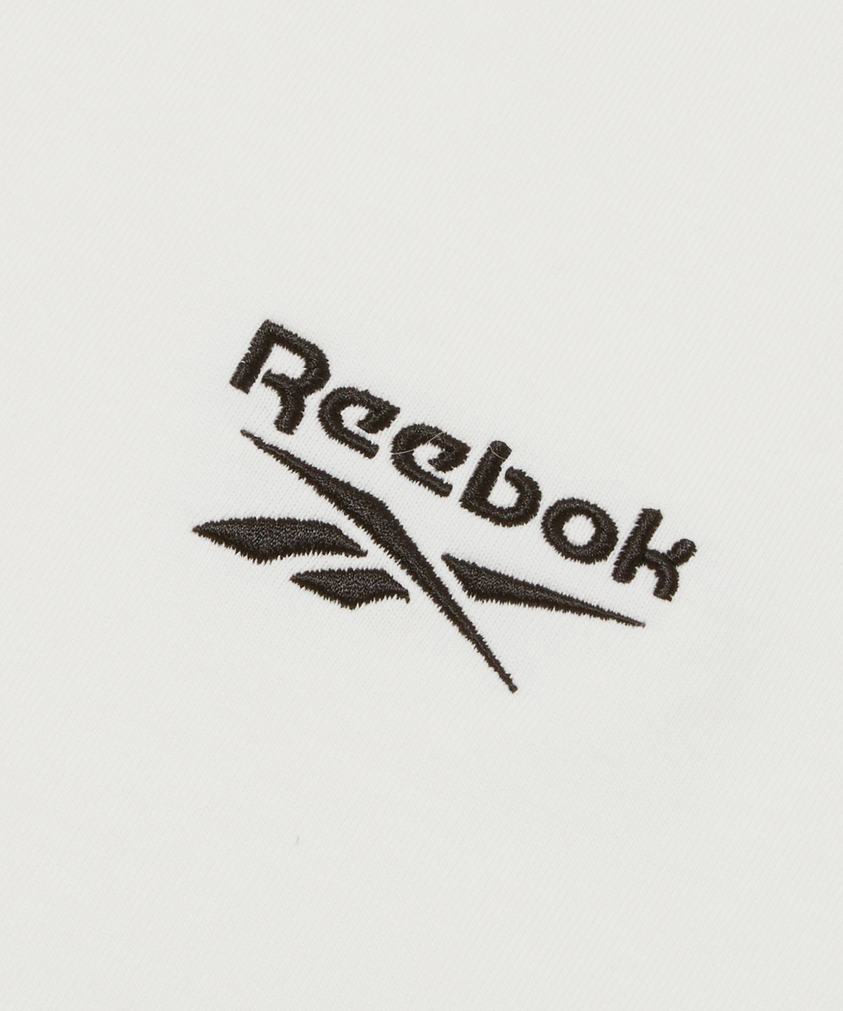 리복(REEBOK) 스몰 로고 티셔츠 - 오프 화이트