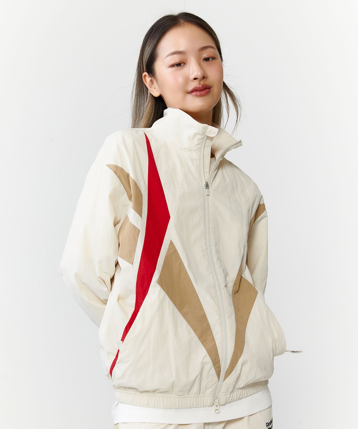 리복(REEBOK) 벡터 플래시 윈드 브레이커 - 베이지
