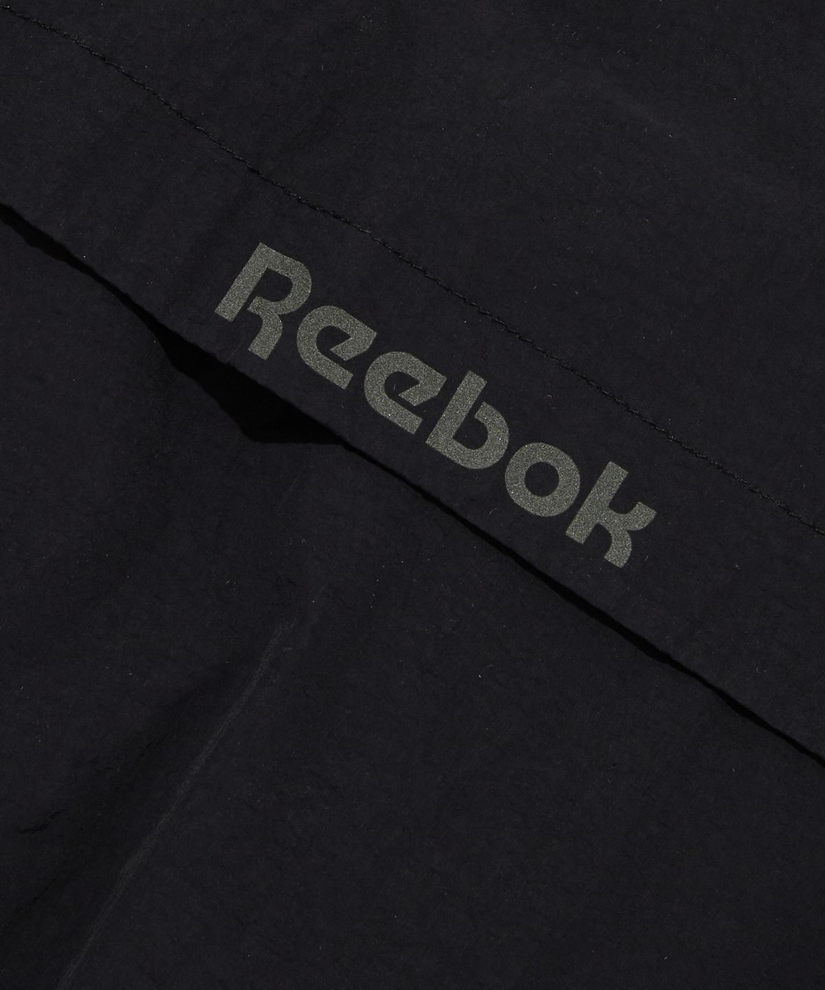 리복(REEBOK) 벡터 플래시 윈드 브레이커 - 블랙