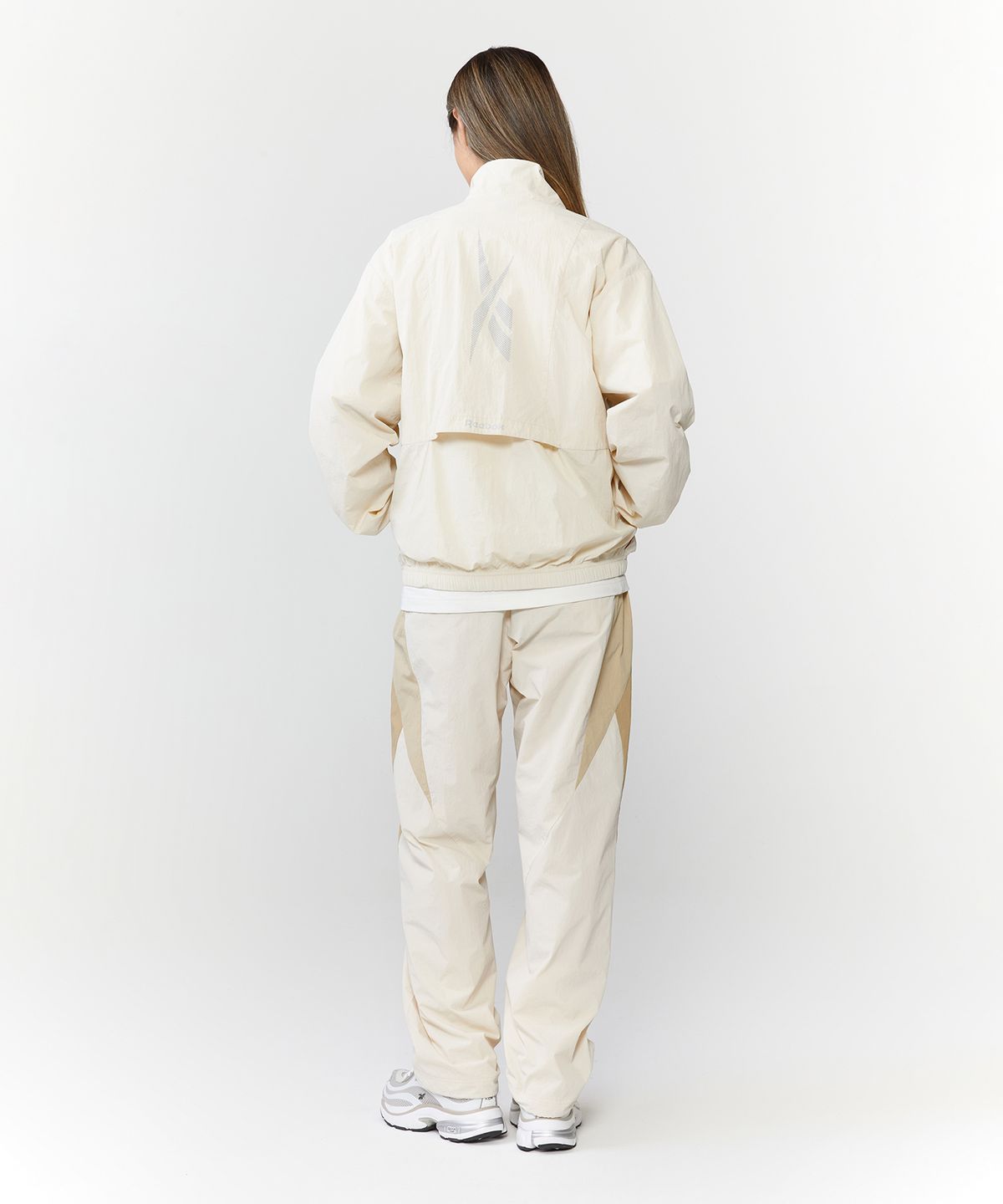 리복(REEBOK) 벡터 플래시 2WAY 웜업 팬츠 - 베이지