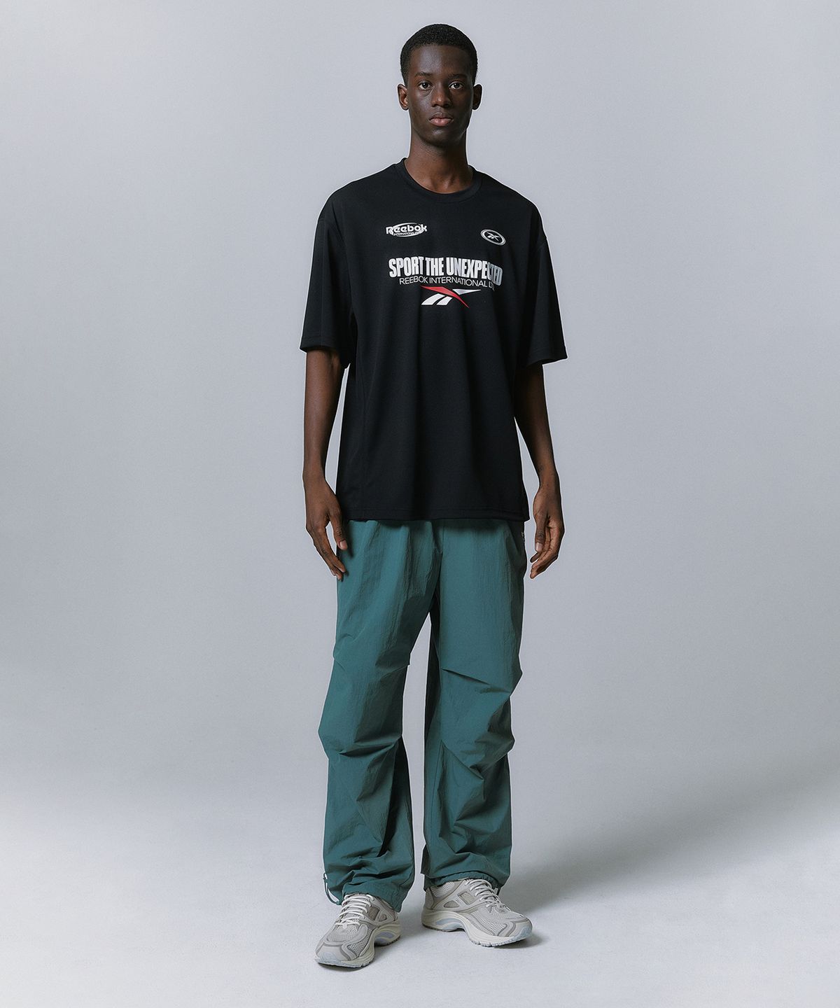리복(REEBOK) 벡터 플래시 파라슈트 팬츠 - 그린