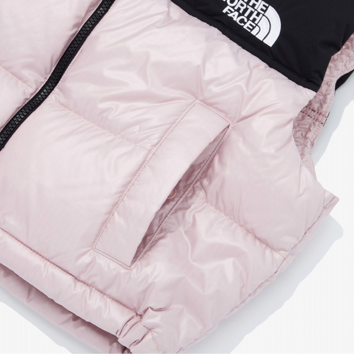노스페이스(THE NORTH FACE) NV1DQ80M 화이트라벨 여성 노벨티 눕시 RDS 다운 베스트_PINK