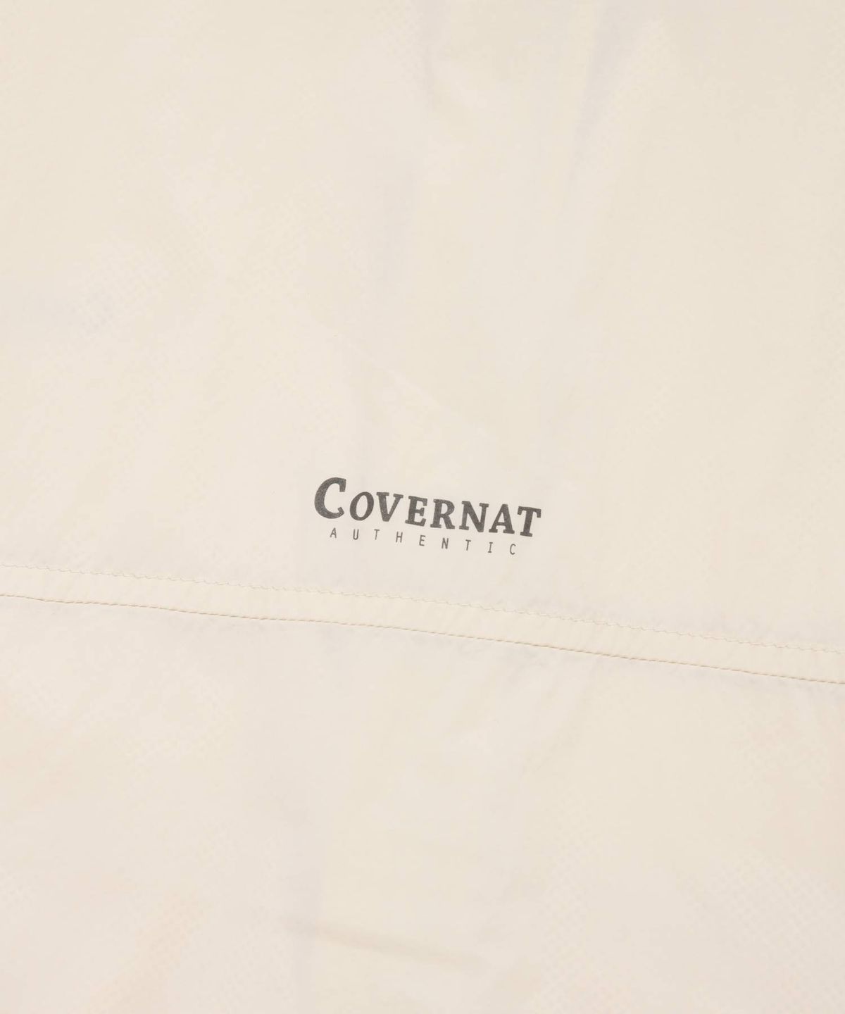 커버낫(COVERNAT) 경량 패커블 윈드브레이커 에크루