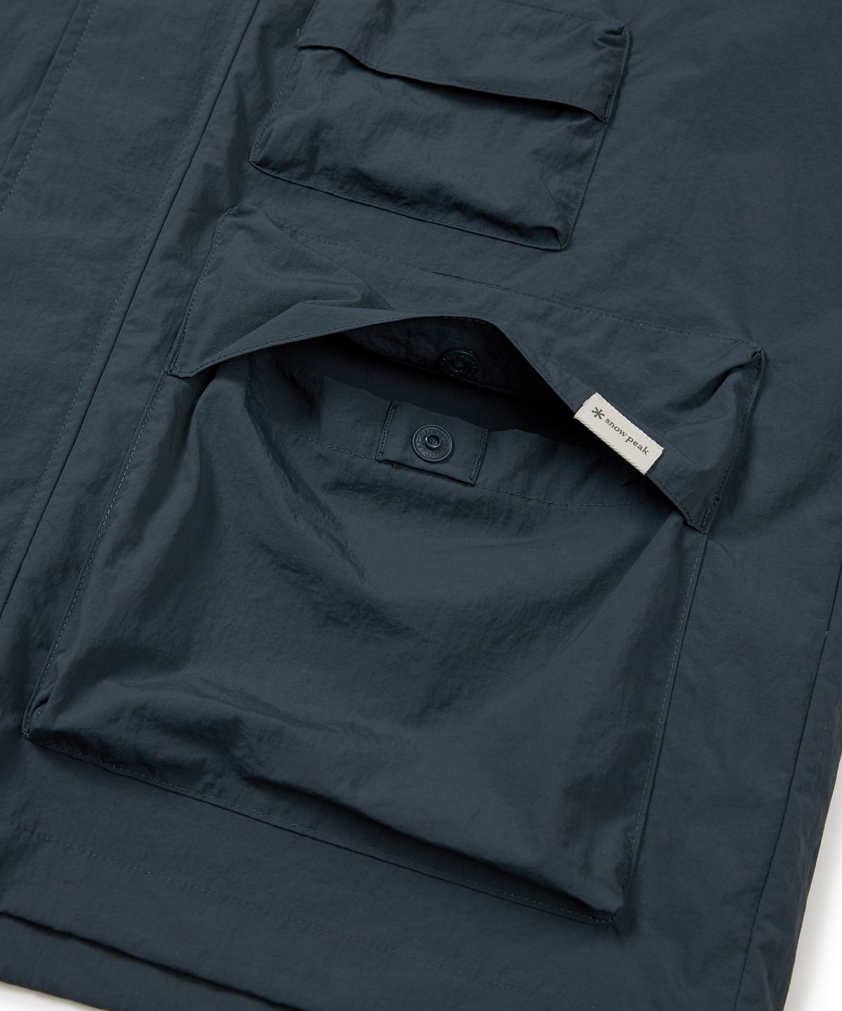 스노우피크 어패럴(SNOWPEAK APPAREL) 타슬란 우븐 유틸리티 바람막이 Vintage Green (S24MMLWB56)