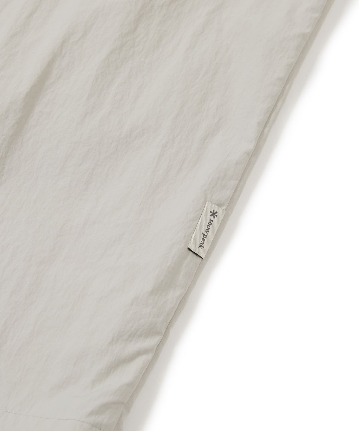 스노우피크 어패럴(SNOWPEAK APPAREL) 타슬란 우븐 유틸리티 바람막이 Light Beige (S24MMLWB56)