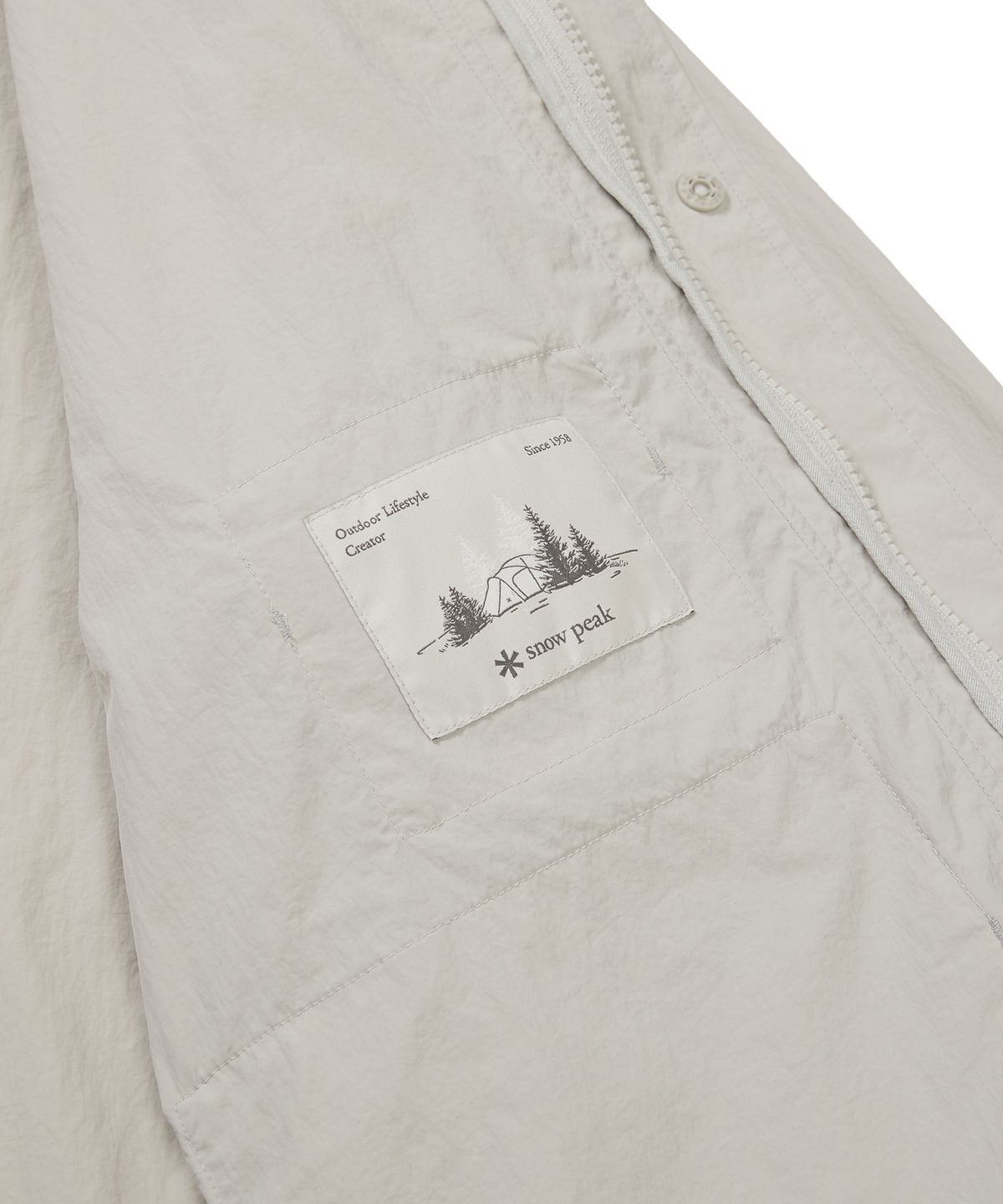 스노우피크 어패럴(SNOWPEAK APPAREL) 타슬란 우븐 유틸리티 바람막이 Light Beige (S24MMLWB56)