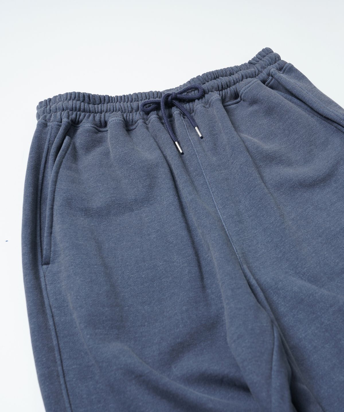 프리즘웍스(FRIZMWORKS) PIGMENT TERRY TRACK PANTS _ BLUE