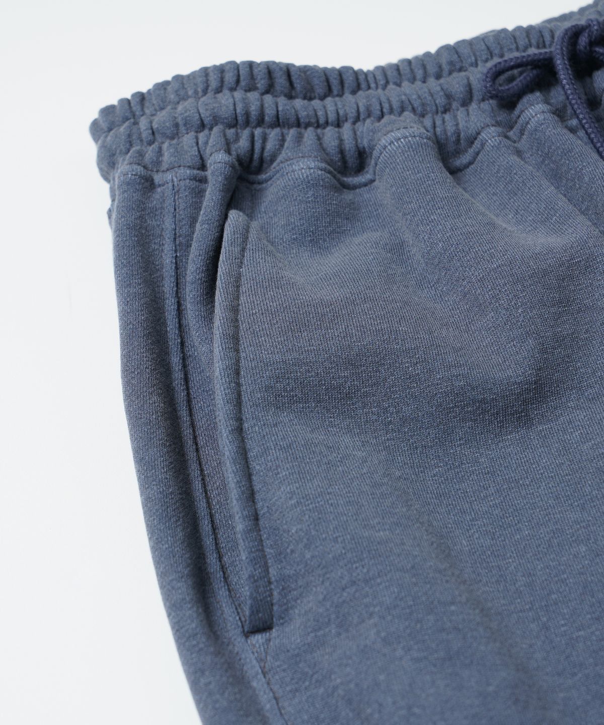 프리즘웍스(FRIZMWORKS) PIGMENT TERRY TRACK PANTS _ BLUE