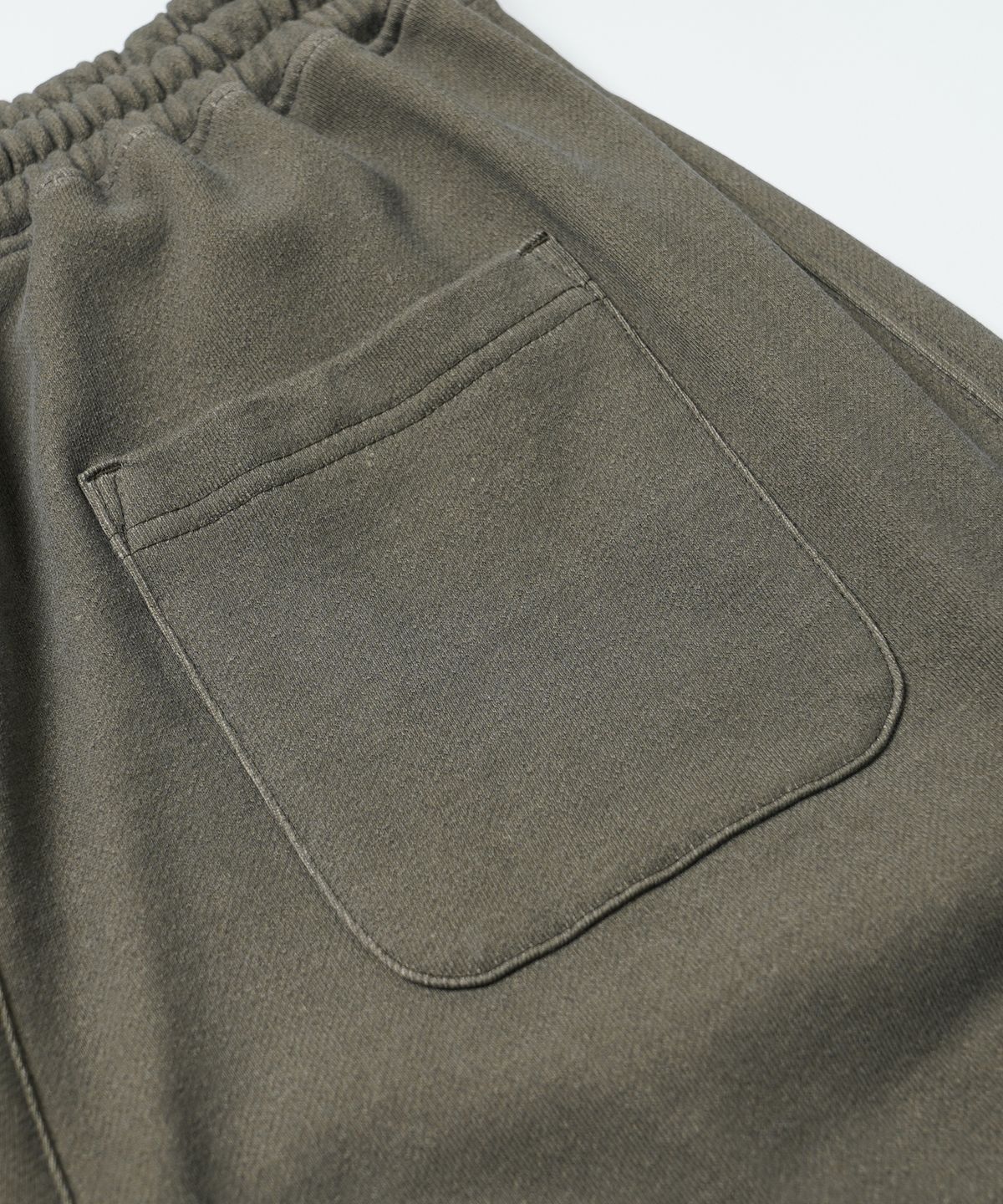 프리즘웍스(FRIZMWORKS) PIGMENT TERRY TRACK PANTS _ OLIVE