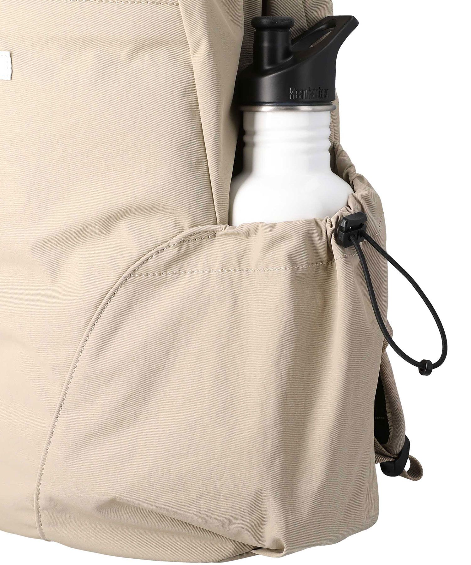 MUSINSA | NEIKIDNIS Aero String Backpack - Beige