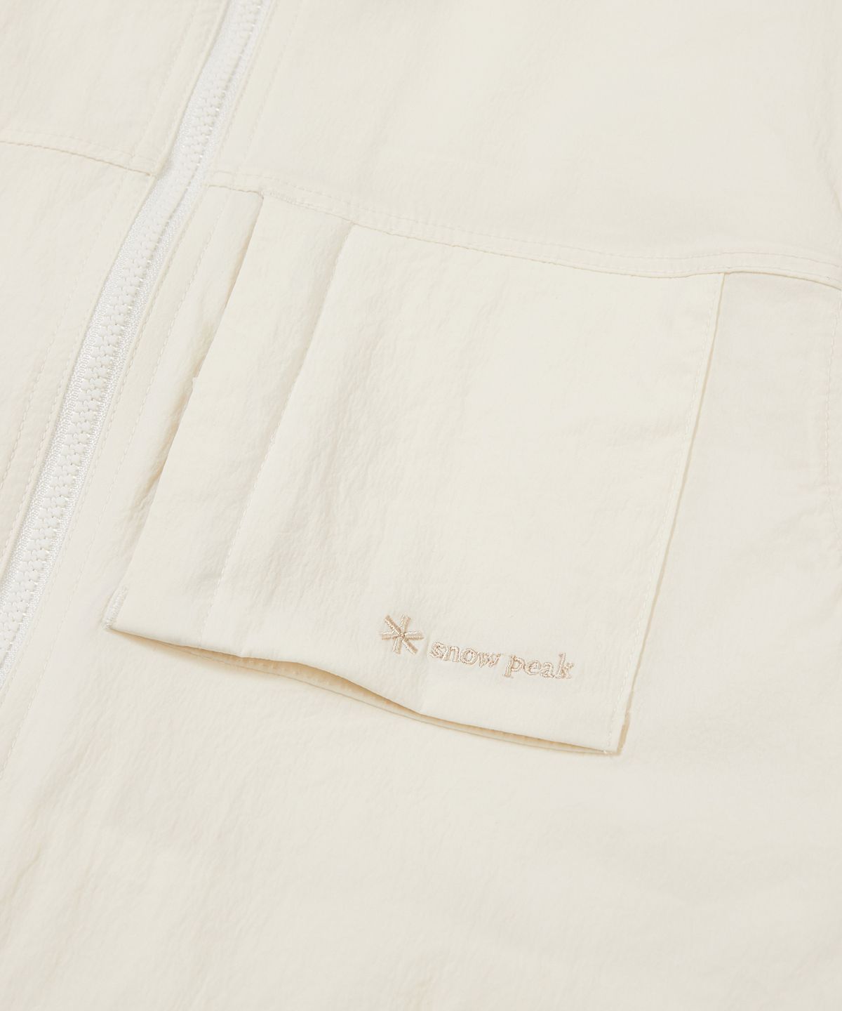 스노우피크 어패럴 키즈(SNOWPEAK APPAREL KIDS) 키즈 루트 아웃포켓 바람막이 Butter Ivory (S24MKRWB80)