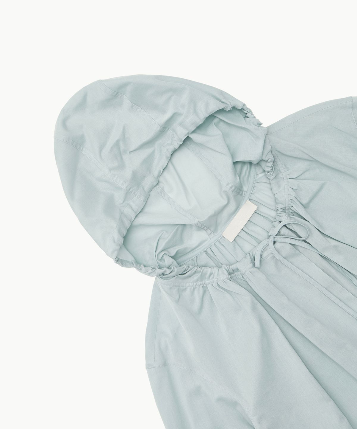 아모멘토(AMOMENTO) SHEER SHIRRING HOODED BLOUSE_LIGHT BLUE